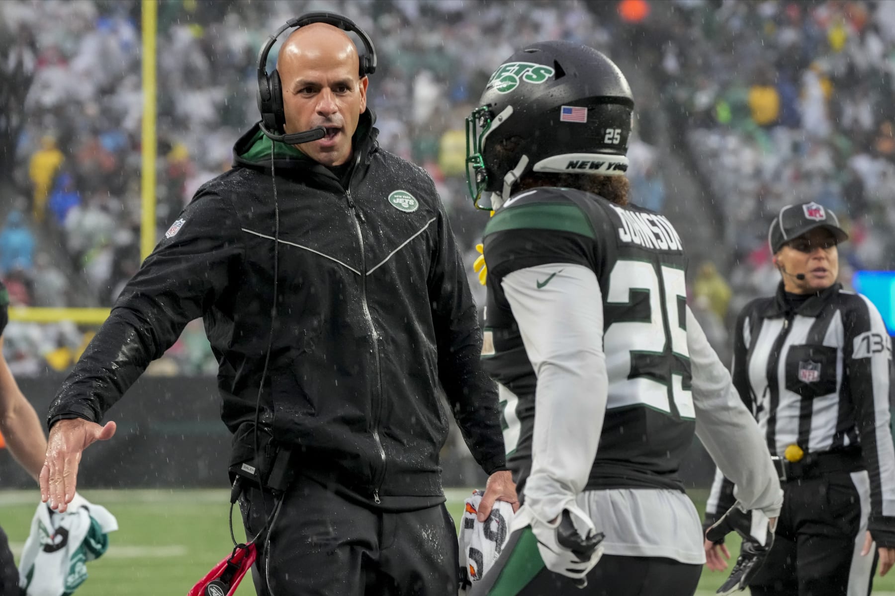 New York Jets head coach Robert Saleh congratulates New York Jets running back Ty Johnson (25) after Johnson scored a touchdown against the Chicago Bears during the third quarter of an NFL football game, Sunday, Nov. 27, 2022, in East Rutherford, N.J. (AP Photo/John Minchillo)