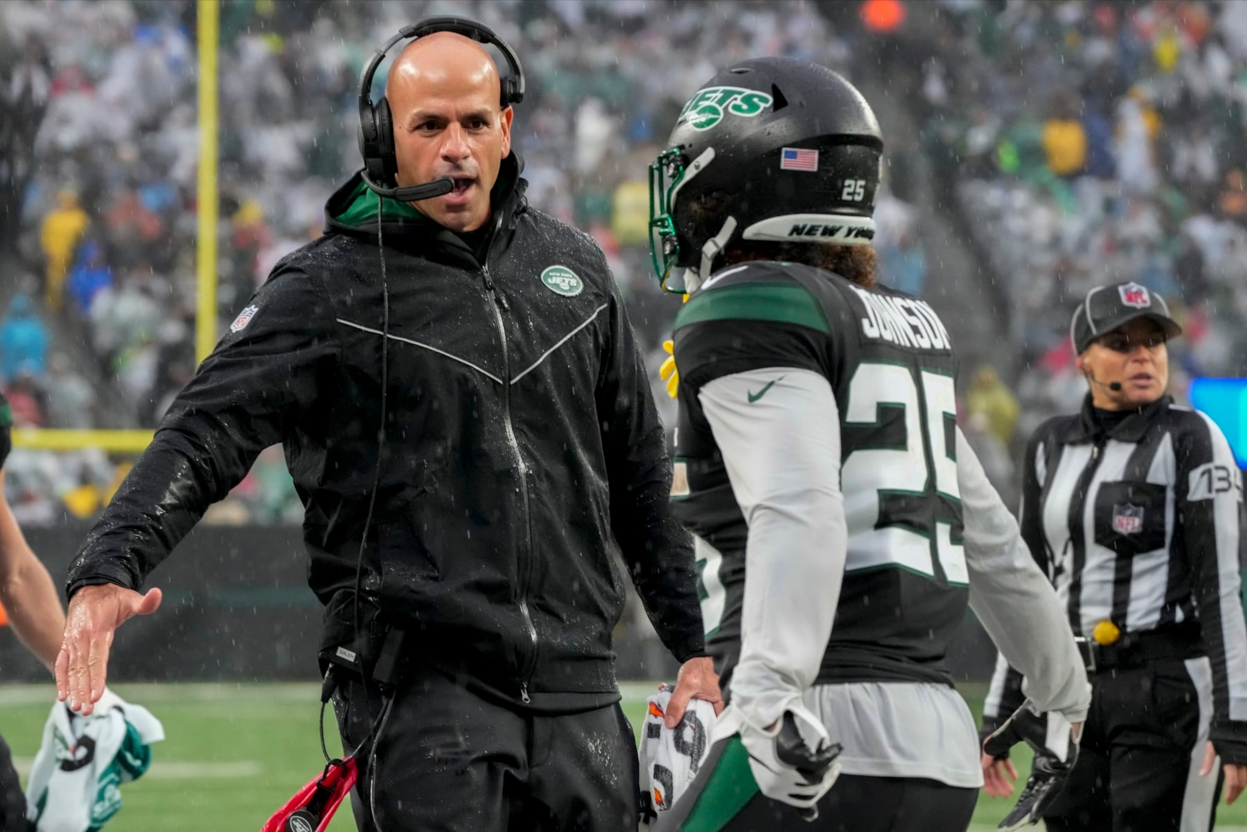 New York Jets head coach Robert Saleh congratulates New York Jets running back Ty Johnson (25) after Johnson scored a touchdown against the Chicago Bears during the third quarter of an NFL football game, Sunday, Nov. 27, 2022, in East Rutherford, N.J. (AP Photo/John Minchillo) New York Jets head coach Robert Saleh congratulates New York Jets running back Ty Johnson (25) after Johnson scored a touchdown against the Chicago Bears during the third quarter of an NFL football game, Sunday, Nov. 27, 2022, in East Rutherford, N.J. (AP Photo/John Minchillo)