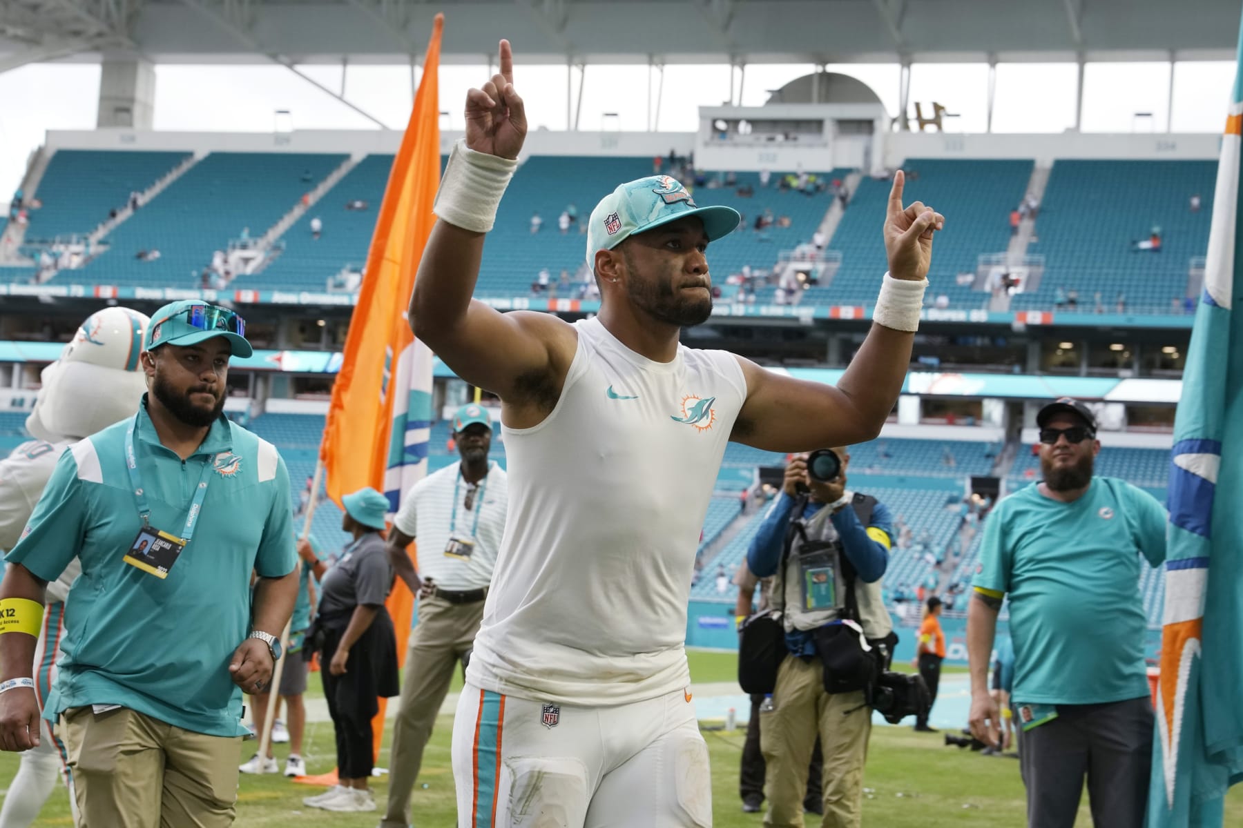 Miami Dolphins quarterback Tua Tagovailoa (1) leaves the field after an NFL football game against the Houston Texans, Sunday, Nov. 27, 2022, in Miami Gardens, Fla. The Dolphins defeated the Texans 30-15. (AP Photo/Lynne Sladky)