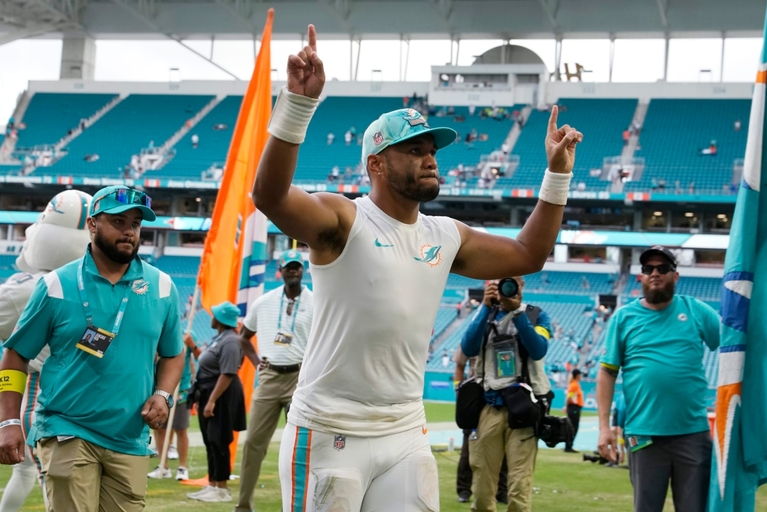 Miami Dolphins quarterback Tua Tagovailoa (1) leaves the field after an NFL football game against the Houston Texans, Sunday, Nov. 27, 2022, in Miami Gardens, Fla. The Dolphins defeated the Texans 30-15. (AP Photo/Lynne Sladky) Miami Dolphins quarterback Tua Tagovailoa (1) leaves the field after an NFL football game against the Houston Texans, Sunday, Nov. 27, 2022, in Miami Gardens, Fla. The Dolphins defeated the Texans 30-15. (AP Photo/Lynne Sladky)