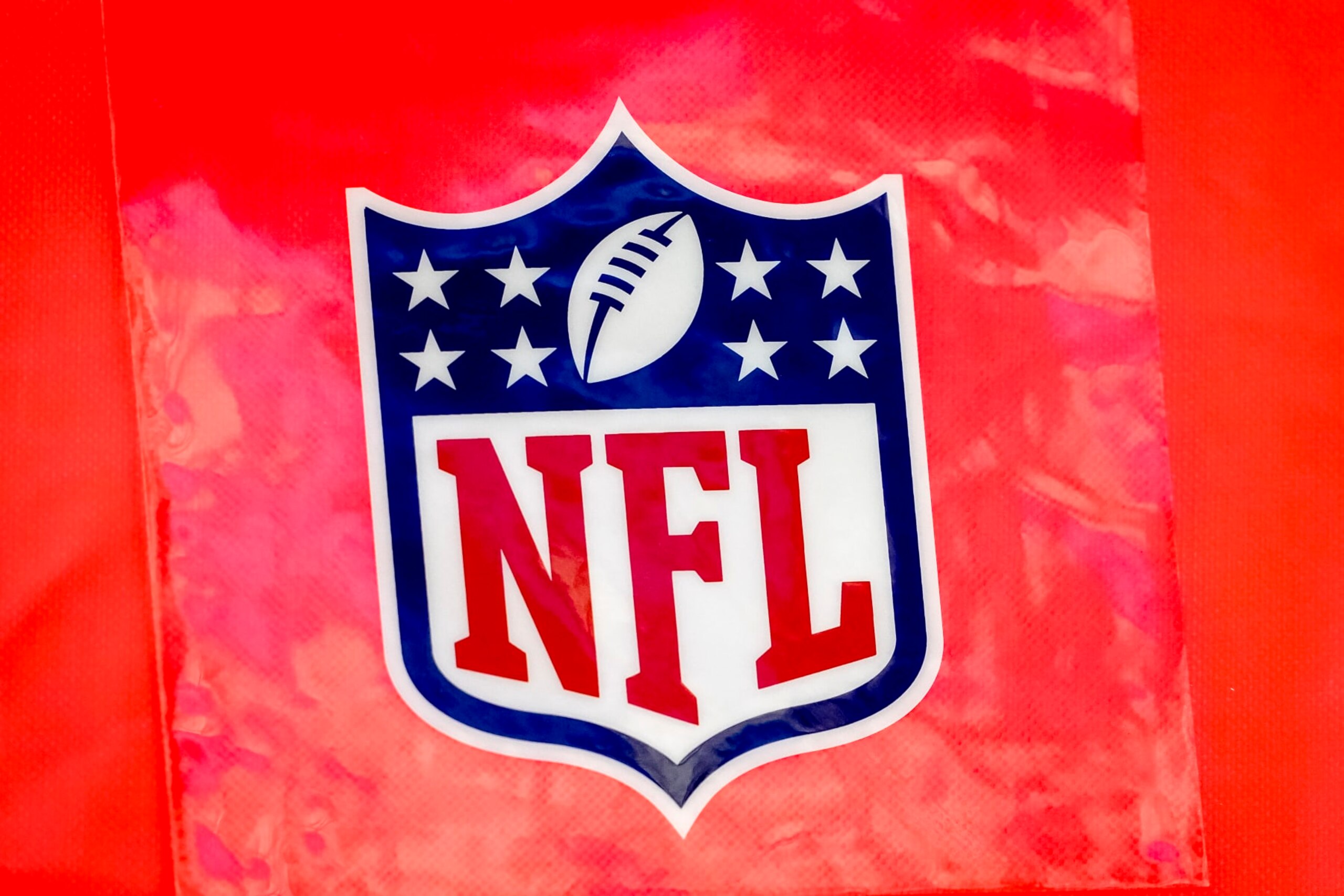 DETROIT, MICHIGAN - NOVEMBER 24: The NFL logo is pictured during the game between the Detroit Lions and Buffalo Bills at Ford Field on November 24, 2022 in Detroit, Michigan. (Photo by Nic Antaya/Getty Images) DETROIT, MICHIGAN - NOVEMBER 24: The NFL logo is pictured during the game between the Detroit Lions and Buffalo Bills at Ford Field on November 24, 2022 in Detroit, Michigan. (Photo by Nic Antaya/Getty Images)