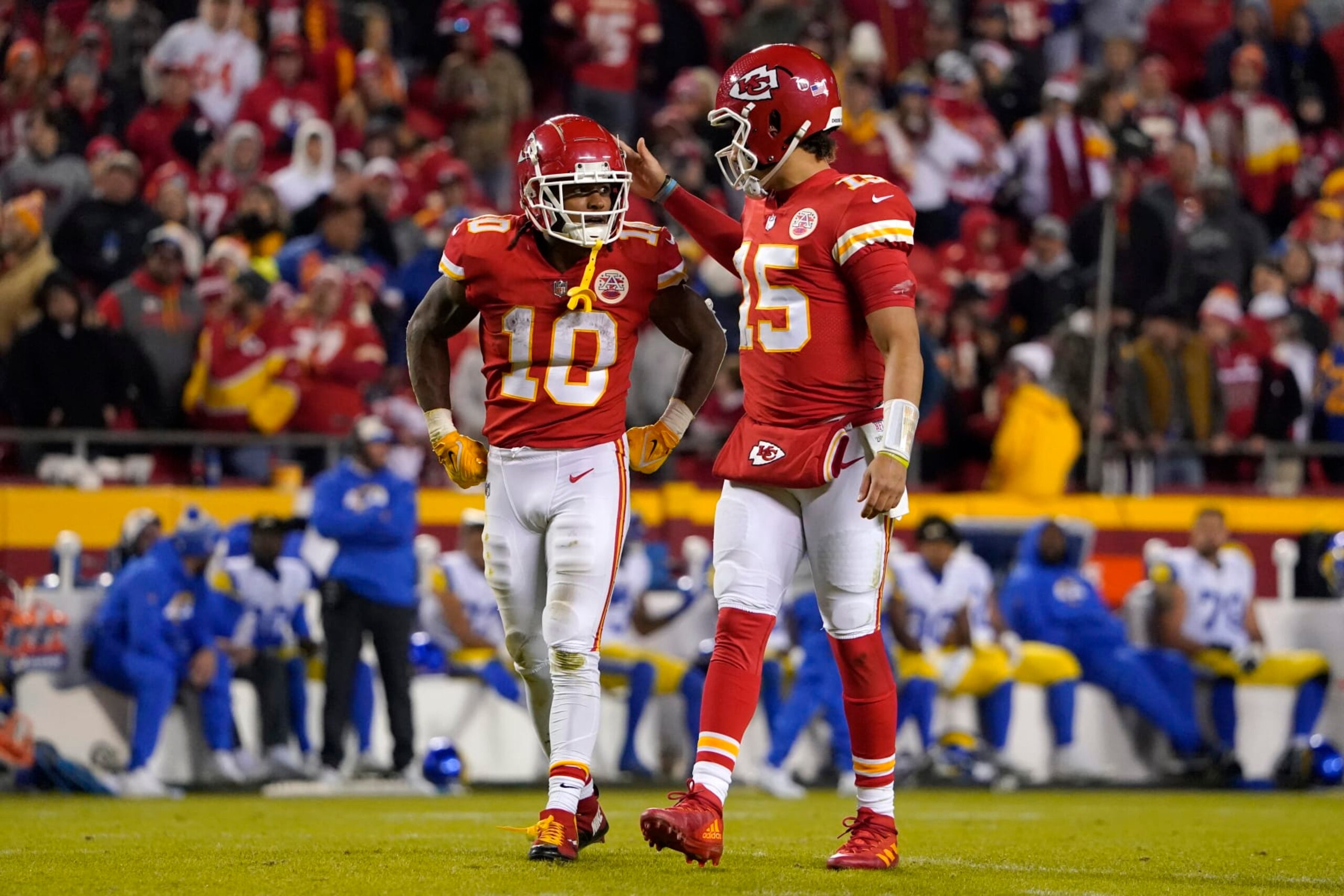 Kansas City Chiefs running back Isiah Pacheco (10) talks with teammate quarterback Patrick Mahomes (15) during the second half of an NFL football game against the Los Angeles Rams Sunday, Nov. 27, 2022, in Kansas City, Mo. (AP Photo/Ed Zurga)