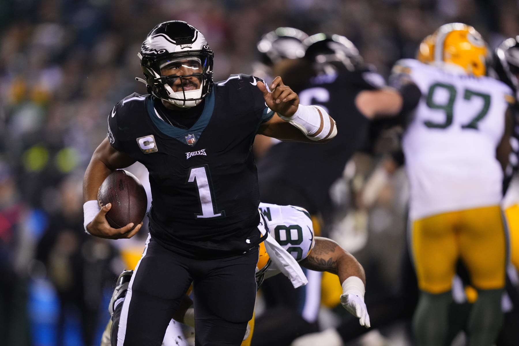 Philadelphia Eagles quarterback Jalen Hurts runs during the second half of an NFL football game against the Green Bay Packers, Sunday, Nov. 27, 2022, in Philadelphia. (AP Photo/Matt Rourke)