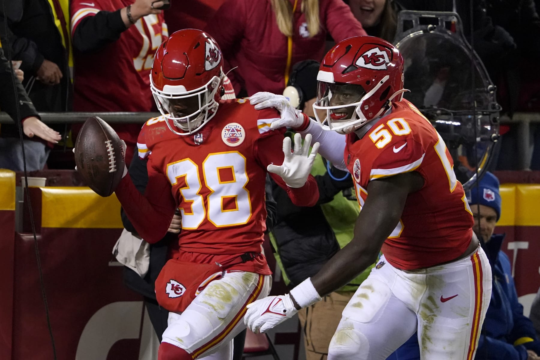 Kansas City Chiefs cornerback L'Jarius Sneed (38) celebrates with teammate linebacker Willie Gay (50) after intercepting a pass during the second half of an NFL football game against the Los Angeles Rams Sunday, Nov. 27, 2022, in Kansas City, Mo. (AP Photo/Ed Zurga)