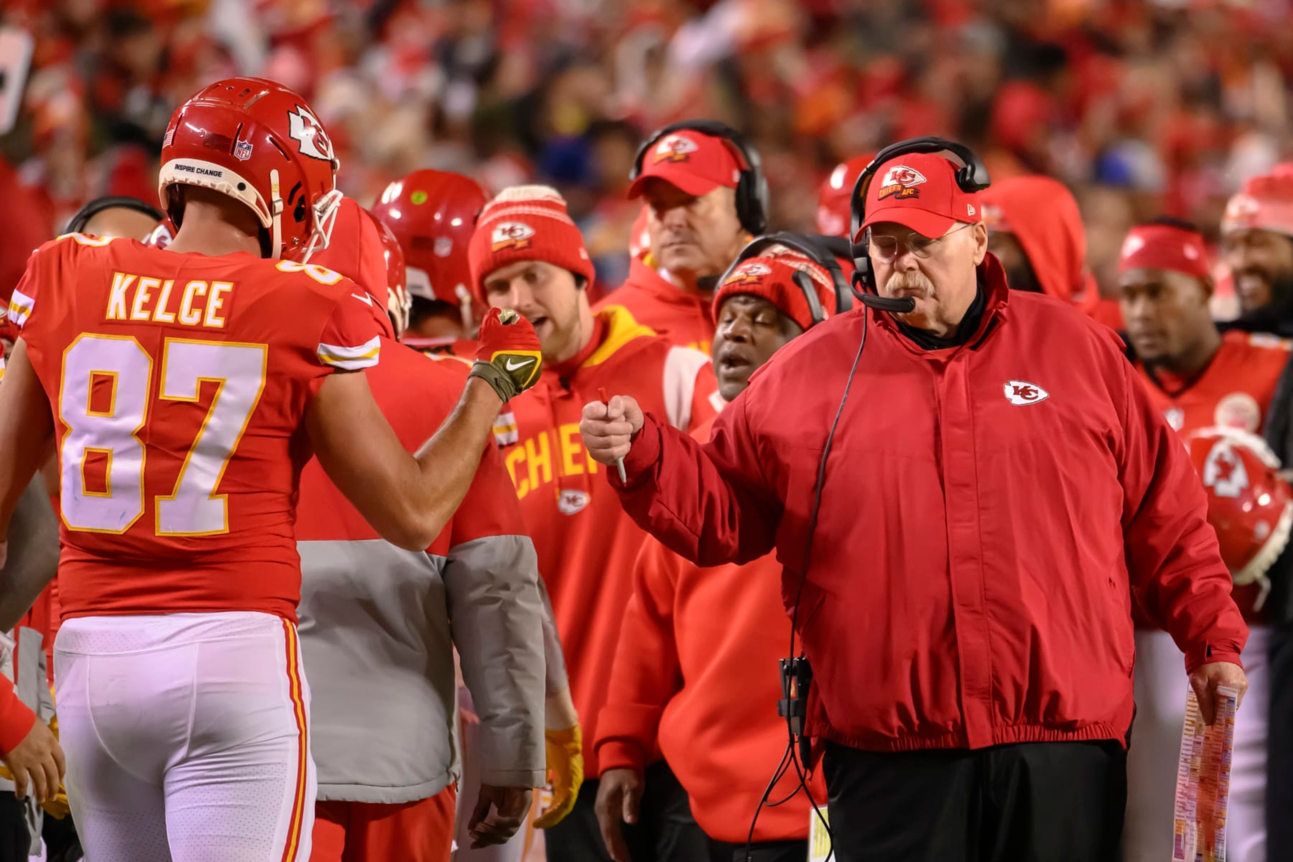 Kansas City Chiefs head coach Andy Reid gives Kansas City Chiefs tight end Travis Kelce (87) a fist bump after a scoring drive during the second half of an NFL football game against the Los Angeles Rams, Sunday, Nov. 27, 2022 in Kansas City, Mo. (AP Photo/Reed Hoffmann) Kansas City Chiefs head coach Andy Reid gives Kansas City Chiefs tight end Travis Kelce (87) a fist bump after a scoring drive during the second half of an NFL football game against the Los Angeles Rams, Sunday, Nov. 27, 2022 in Kansas City, Mo. (AP Photo/Reed Hoffmann)