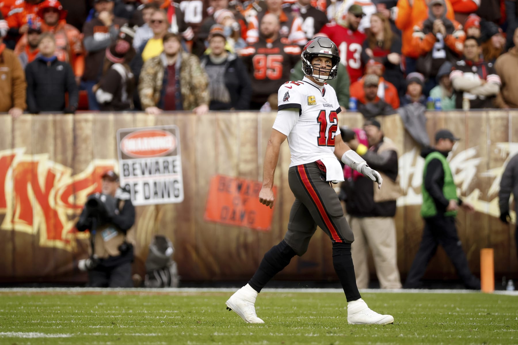 Tampa Bay Buccaneers quarterback Tom Brady (12) walks off of the field during an NFL football game against the Cleveland Browns, Sunday, Nov. 27, 2022, in Cleveland. (AP Photo/Kirk Irwin)