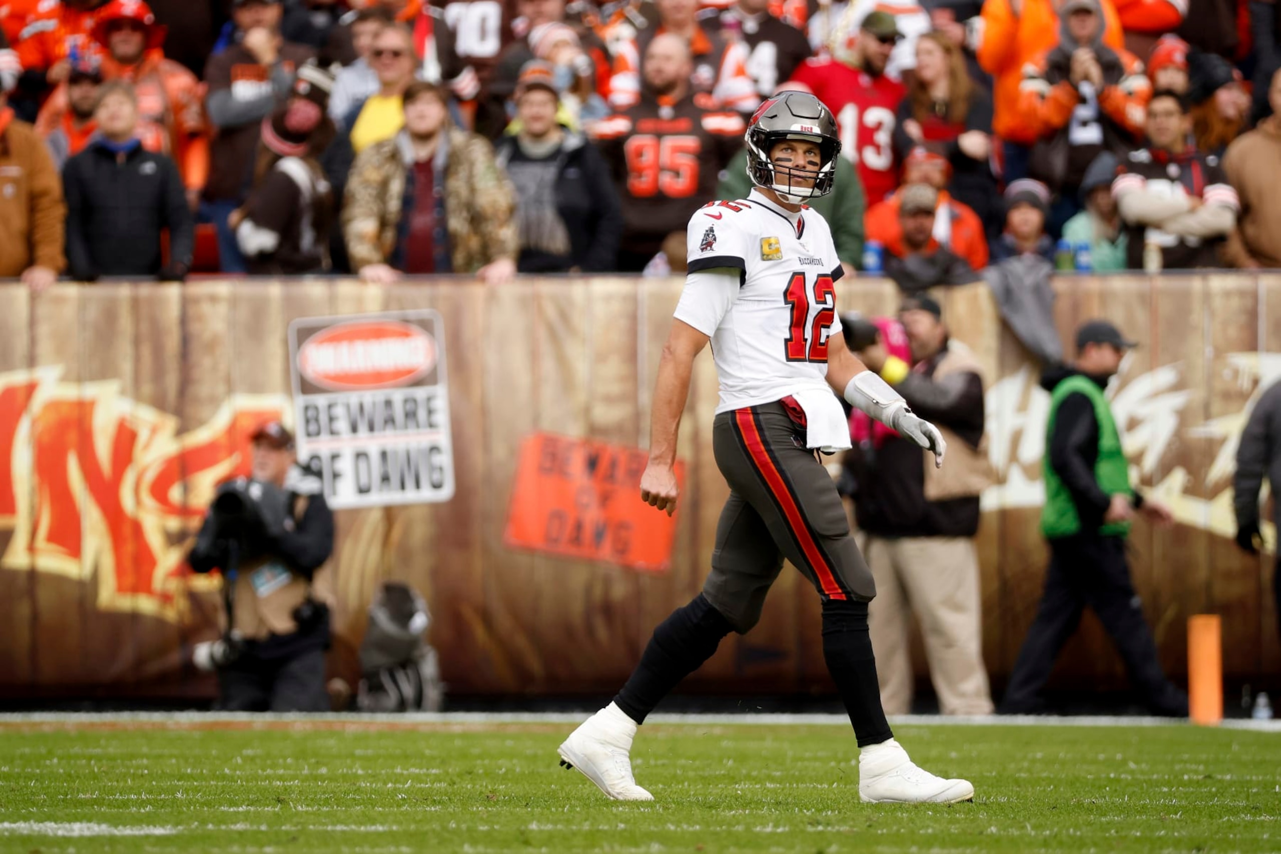 Tampa Bay Buccaneers quarterback Tom Brady (12) walks off of the field during an NFL football game against the Cleveland Browns, Sunday, Nov. 27, 2022, in Cleveland. (AP Photo/Kirk Irwin) Tampa Bay Buccaneers quarterback Tom Brady (12) walks off of the field during an NFL football game against the Cleveland Browns, Sunday, Nov. 27, 2022, in Cleveland. (AP Photo/Kirk Irwin)