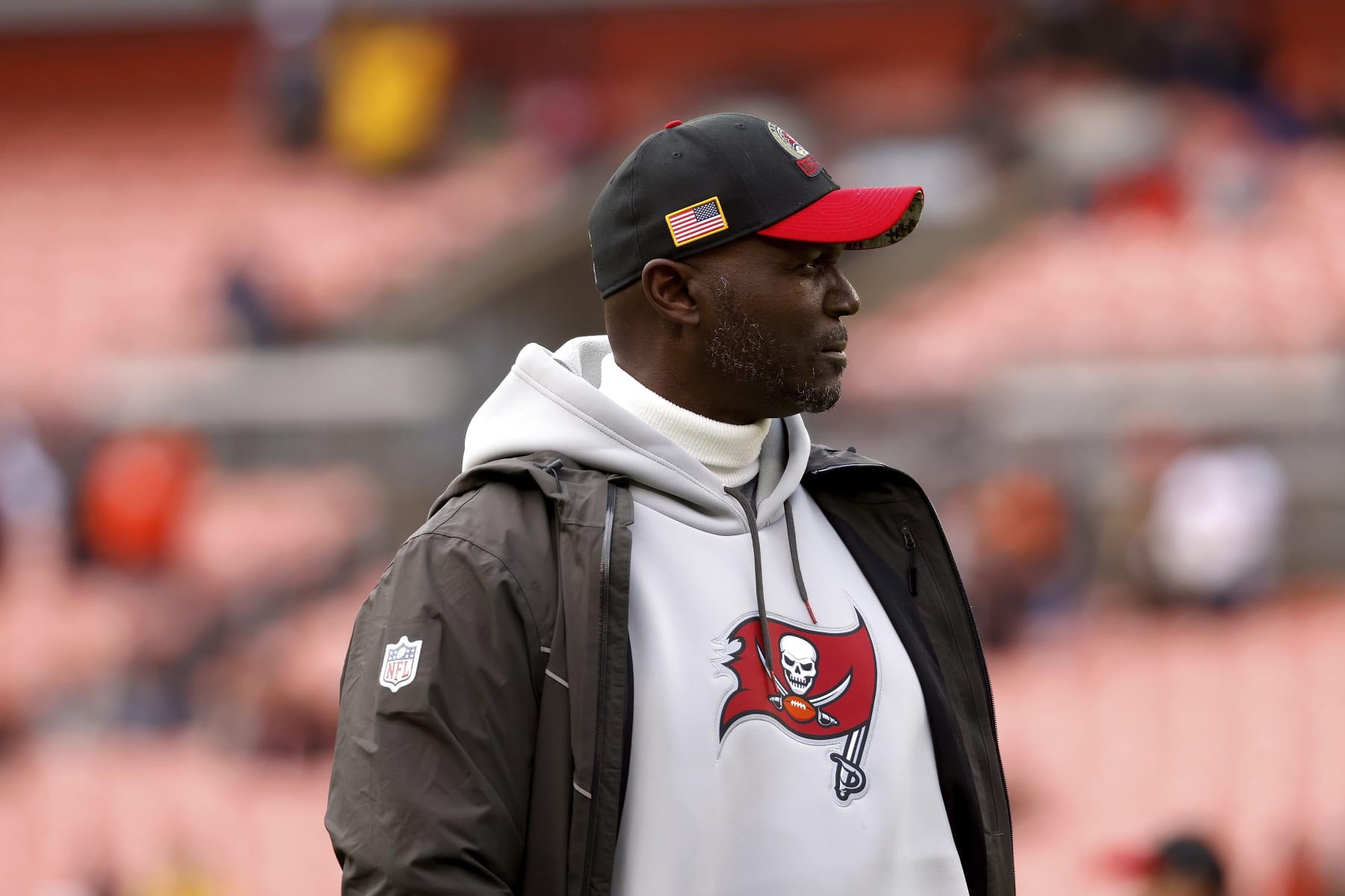 Tampa Bay Buccaneers head coach Todd Bowles walks on the field prior to the start of an NFL football game against the Cleveland Browns, Sunday, Nov. 27, 2022, in Cleveland. (AP Photo/Kirk Irwin)