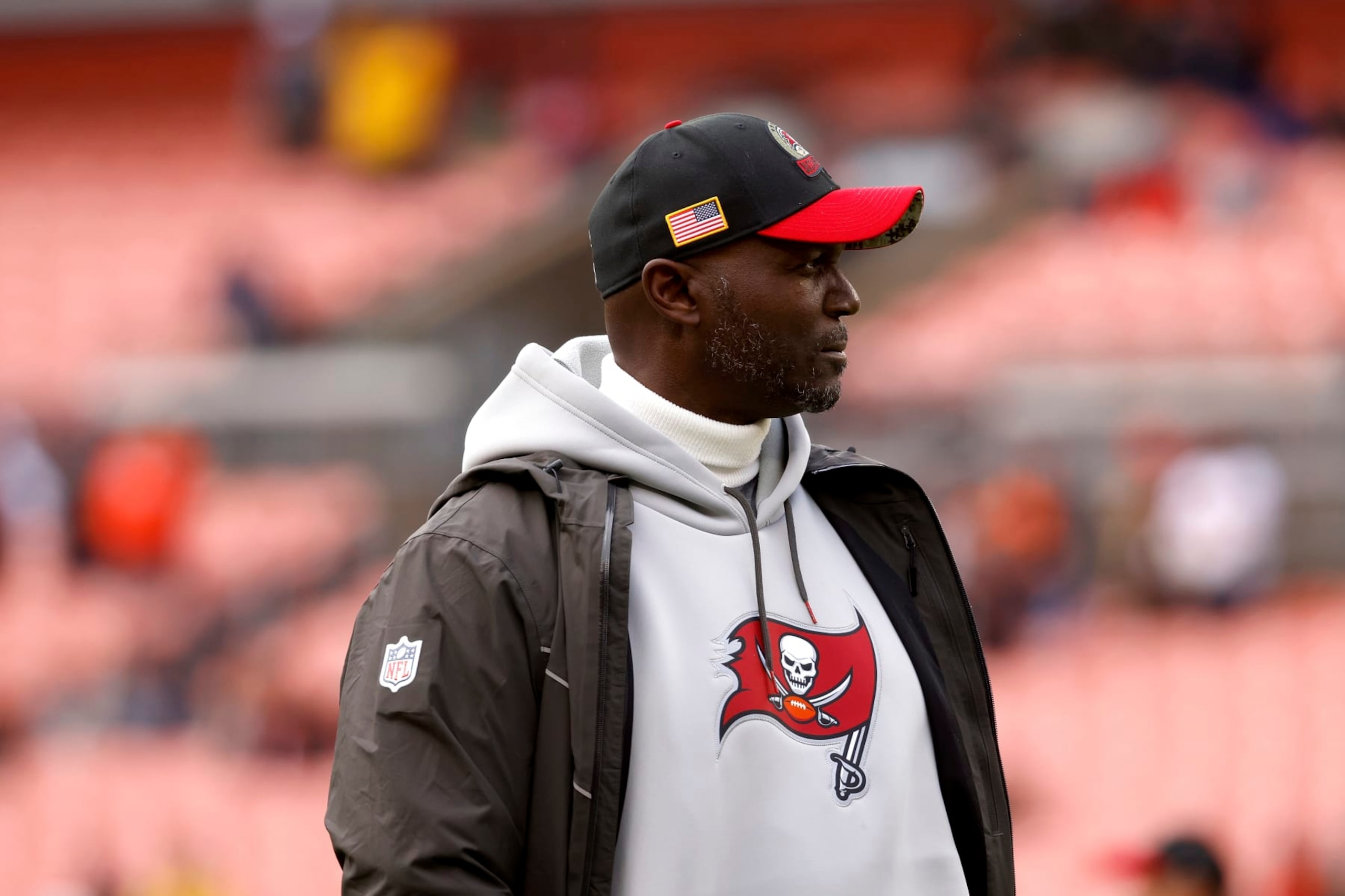 Tampa Bay Buccaneers head coach Todd Bowles walks on the field prior to the start of an NFL football game against the Cleveland Browns, Sunday, Nov. 27, 2022, in Cleveland. (AP Photo/Kirk Irwin) Tampa Bay Buccaneers head coach Todd Bowles walks on the field prior to the start of an NFL football game against the Cleveland Browns, Sunday, Nov. 27, 2022, in Cleveland. (AP Photo/Kirk Irwin)