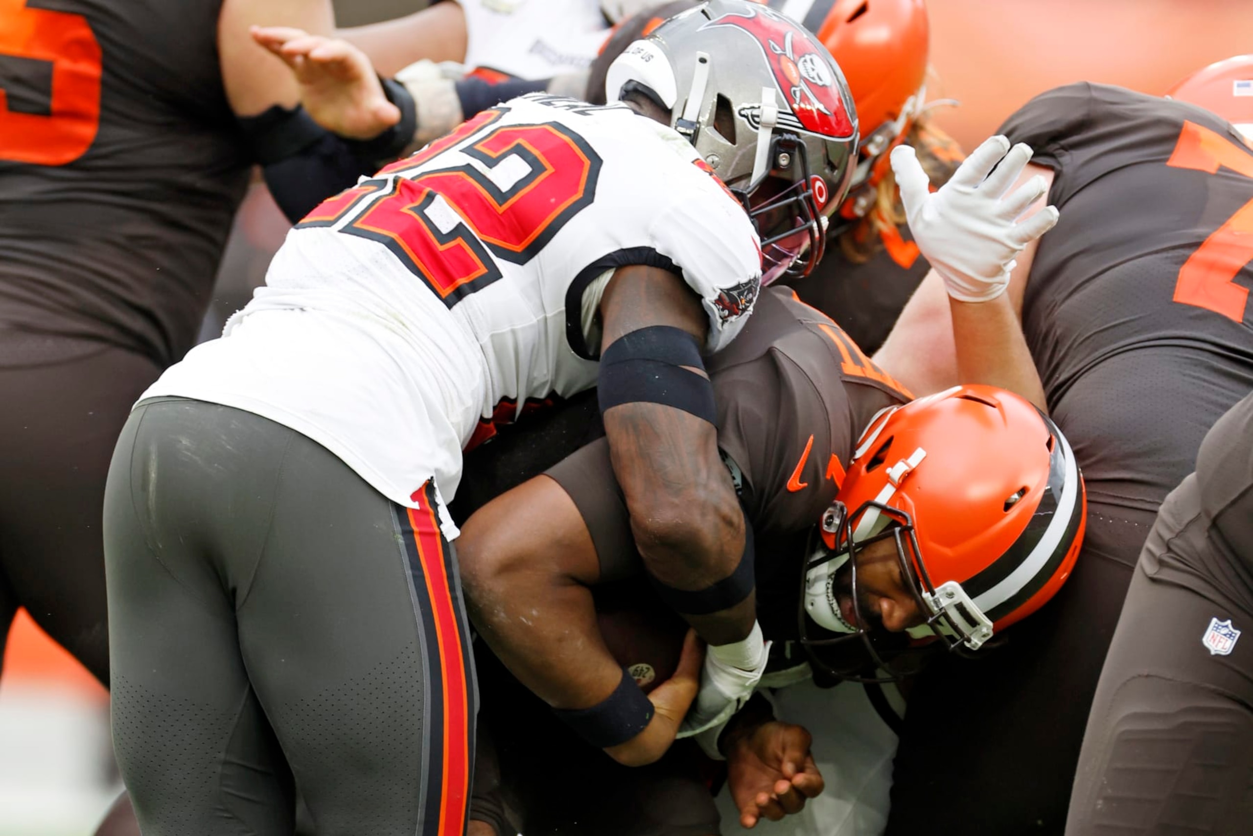 Tampa Bay Buccaneers safety Keanu Neal (22) sacks Cleveland Browns quarterback Jacoby Brissett (7) during the second half of an NFL football game in Cleveland, Sunday, Nov. 27, 2022. (AP Photo/Ron Schwane) Tampa Bay Buccaneers safety Keanu Neal (22) sacks Cleveland Browns quarterback Jacoby Brissett (7) during the second half of an NFL football game in Cleveland, Sunday, Nov. 27, 2022. (AP Photo/Ron Schwane)
