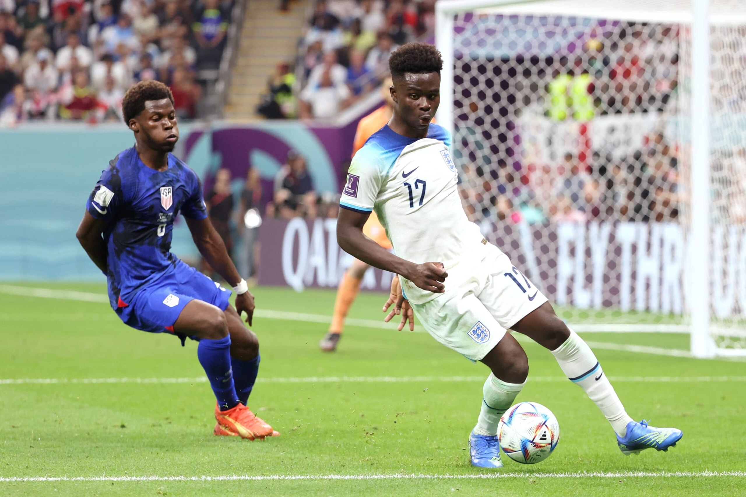 AL KHOR, QATAR - NOVEMBER 25: Bukayo Saka of England, Yunus Musah of USA (L during the FIFA World Cup Qatar 2022 Group B match between England and USA at Al Bayt Stadium on November 25, 2022 in Al Khor, Qatar. (Photo by Jean Catuffe/Getty Images) AL KHOR, QATAR - NOVEMBER 25: Bukayo Saka of England, Yunus Musah of USA (L during the FIFA World Cup Qatar 2022 Group B match between England and USA at Al Bayt Stadium on November 25, 2022 in Al Khor, Qatar. (Photo by Jean Catuffe/Getty Images)