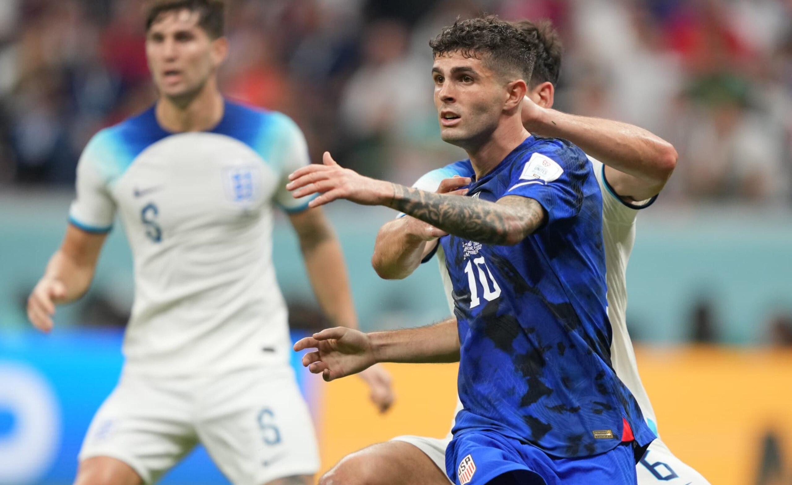AL KHOR, QATAR - NOVEMBER 25: Christian Pulisic #10 of the United States defending his position in the box during a FIFA World Cup Qatar 2022 Group B match between England and USMNT at Al Bayt Stadium on November 25, 2022 in Al Khor, Qatar. (Photo by John Todd/ISI Photos/Getty Images)