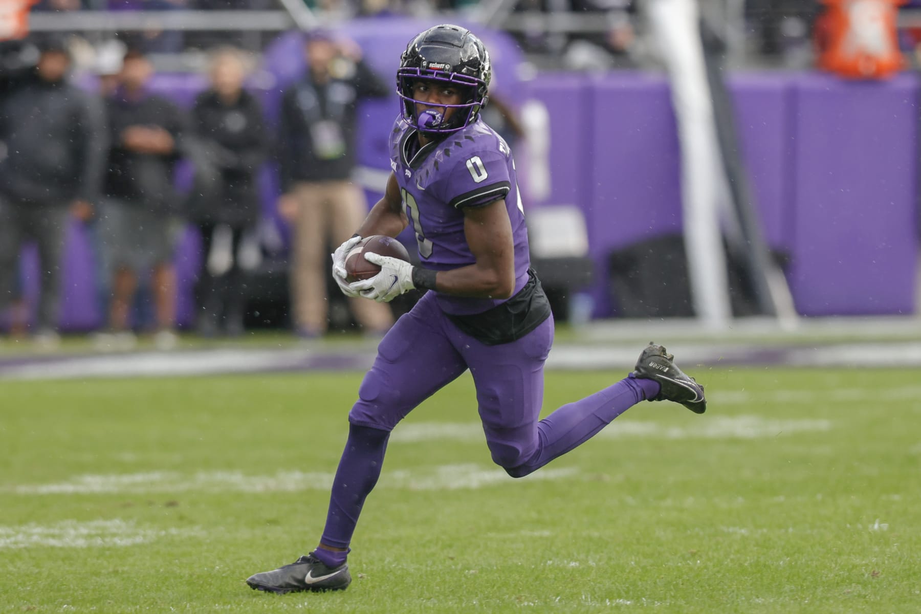 FORT WORTH, TX - NOVEMBER 26: TCU Horned Frogs wide receiver Blair Conwright (0) runs for a first down during the game between the TCU Horned Frogs and the Iowa State Cyclones on November 26, 2022 at Amon G. Carter Stadium in Fort Worth, Texas. (Photo by Matthew Pearce/Icon Sportswire via Getty Images)