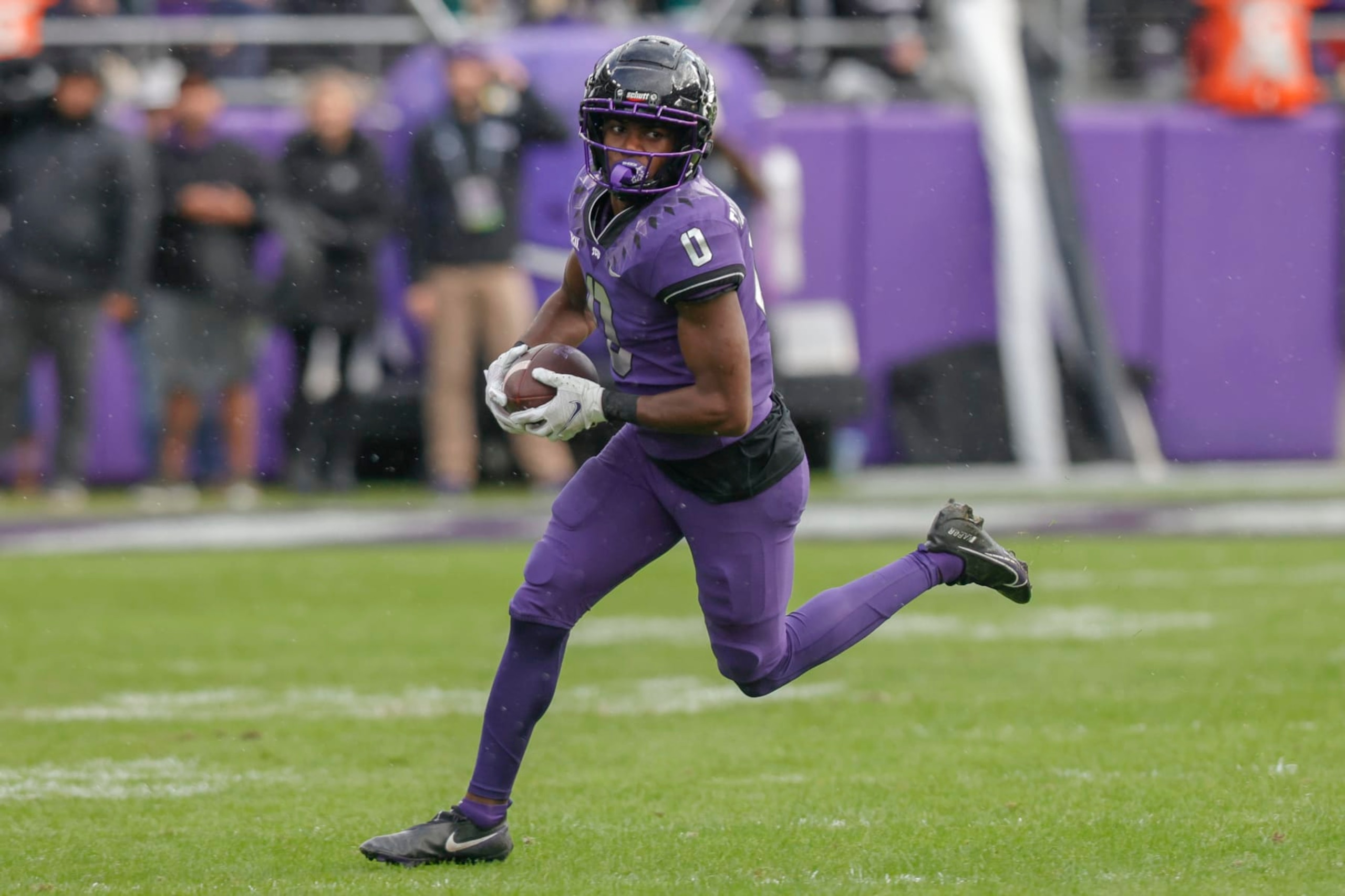 FORT WORTH, TX - NOVEMBER 26: TCU Horned Frogs wide receiver Blair Conwright (0) runs for a first down during the game between the TCU Horned Frogs and the Iowa State Cyclones on November 26, 2022 at Amon G. Carter Stadium in Fort Worth, Texas. (Photo by Matthew Pearce/Icon Sportswire via Getty Images) FORT WORTH, TX - NOVEMBER 26: TCU Horned Frogs wide receiver Blair Conwright (0) runs for a first down during the game between the TCU Horned Frogs and the Iowa State Cyclones on November 26, 2022 at Amon G. Carter Stadium in Fort Worth, Texas. (Photo by Matthew Pearce/Icon Sportswire via Getty Images)