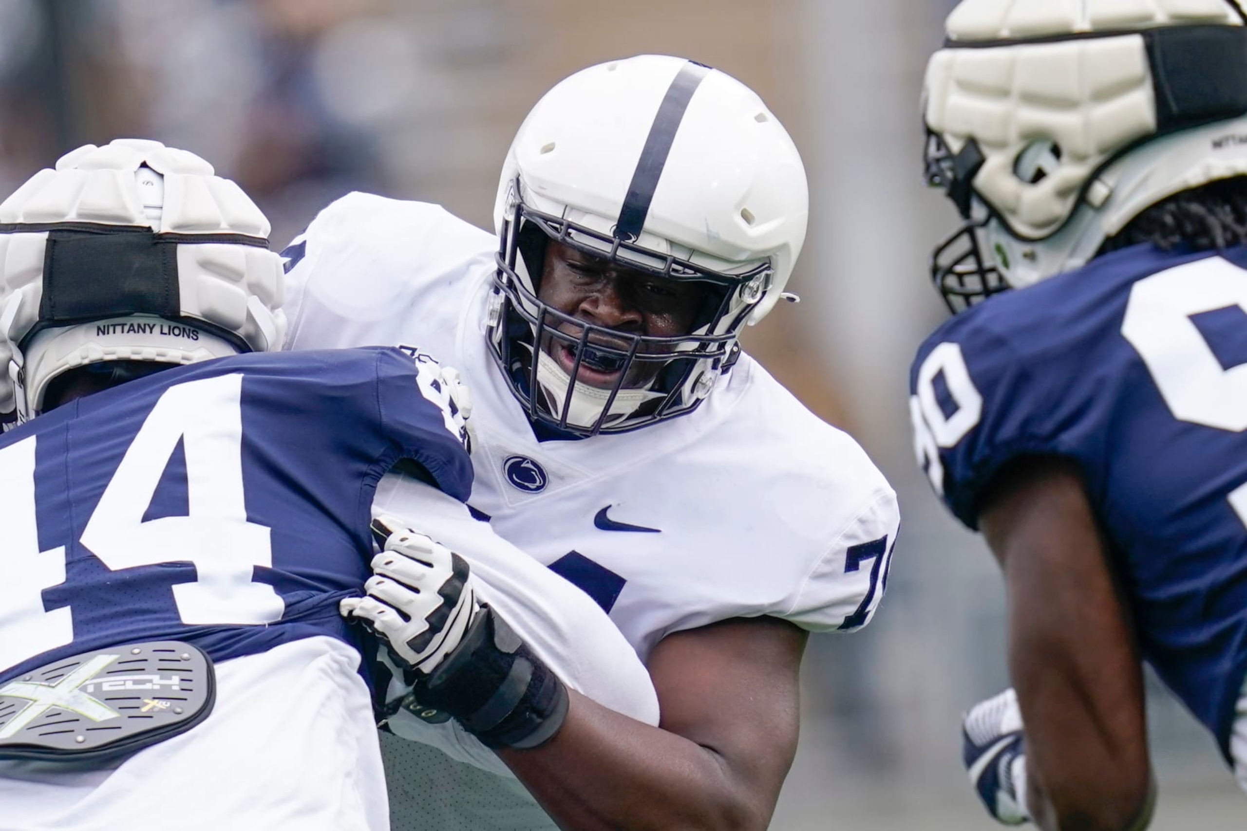 Penn State offensive lineman Olu Fashanu (74) during their NCAA football practice, Saturday, April 17, 2021, in State College, Pa. (AP Photo/Keith Srakocic)