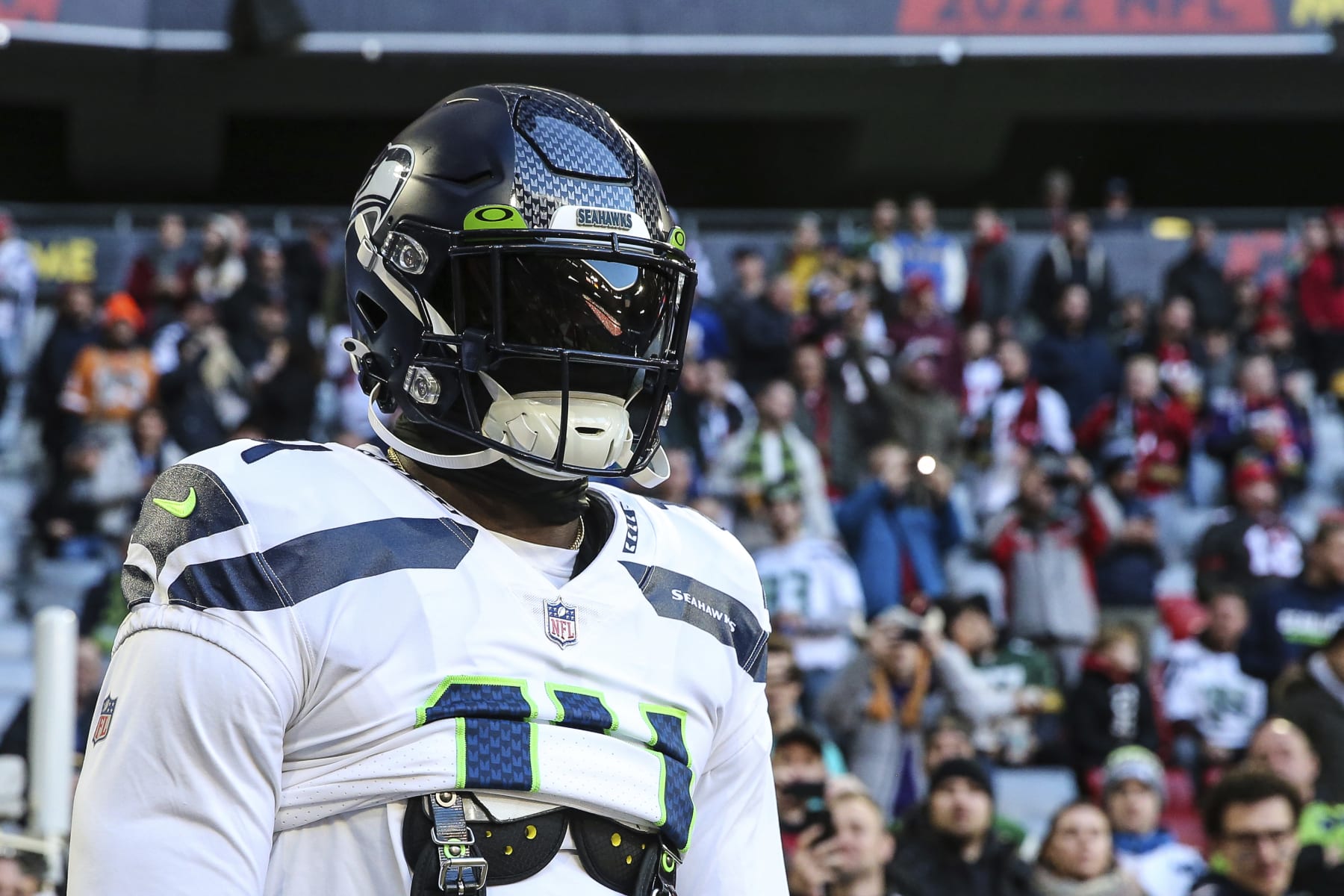 Seattle Seahawks wide receiver DK Metcalf (14) runs onto the field for an NFL football game against the Tampa Bay Buccaneers on Nov. 13, 2022, in Munich. The Buccaneers defeated the Seahawks 21-16. (AP Photo/Gary McCullough)