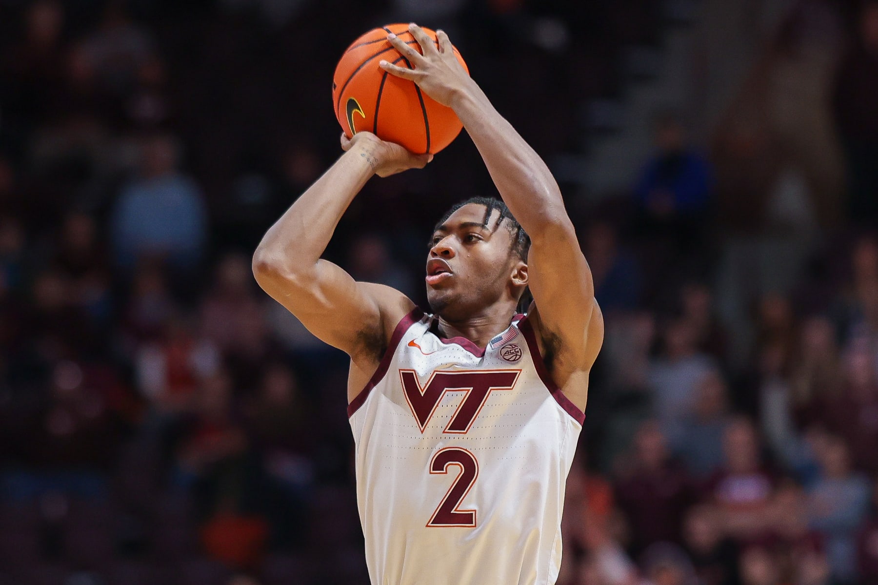 BLACKSBURG, VA - NOVEMBER 28: Guard MJ Collins #2 of the Virginia Tech Hokies shoots against the Minnesota Golden Gophers during the second half at Cassell Coliseum on November 28, 2022 in Blacksburg, Virginia. (Photo by Ryan Hunt/Getty Images)