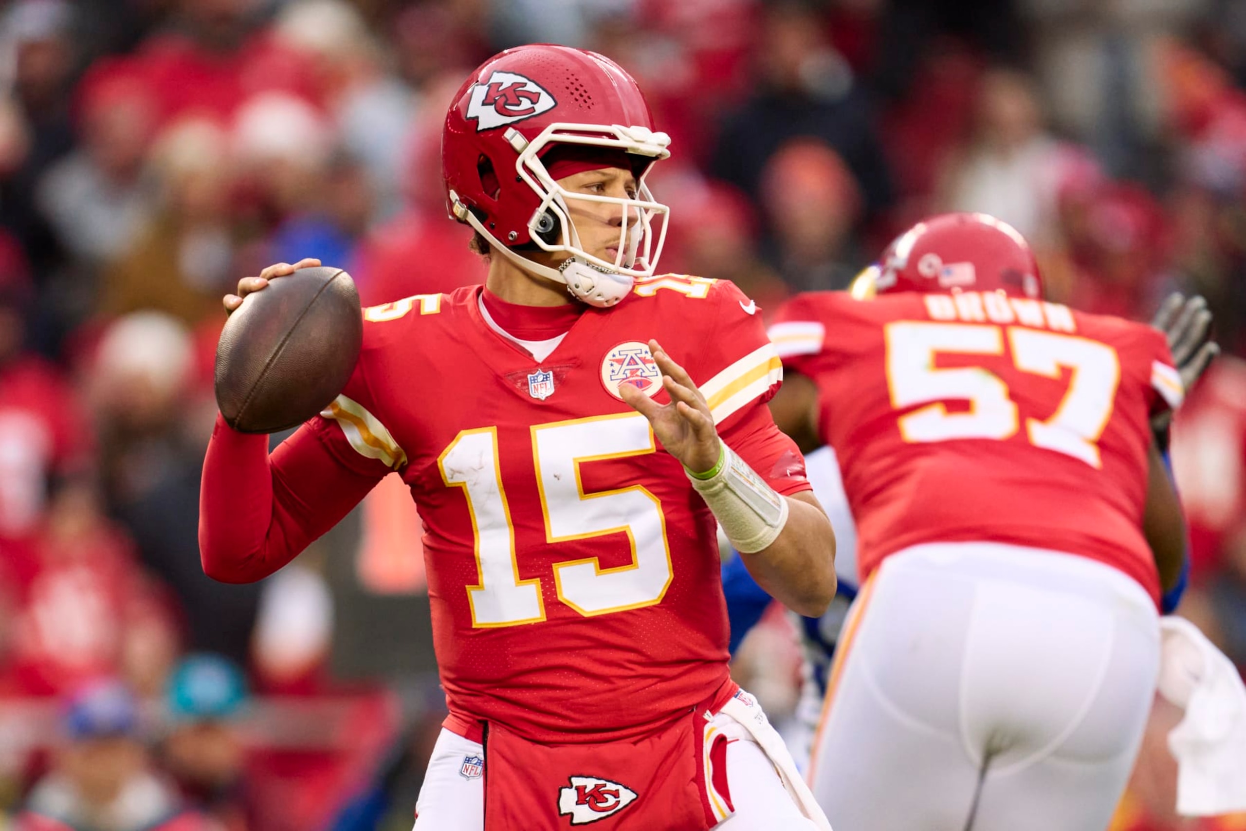 KANSAS CITY, MO - NOVEMBER 27: Patrick Mahomes #15 of the Kansas City Chiefs drops back to pass against the Los Angeles Rams during the first half at GEHA Field at Arrowhead Stadium on November 27, 2022 in Kansas City, Missouri. (Photo by Cooper Neill/Getty Images) KANSAS CITY, MO - NOVEMBER 27: Patrick Mahomes #15 of the Kansas City Chiefs drops back to pass against the Los Angeles Rams during the first half at GEHA Field at Arrowhead Stadium on November 27, 2022 in Kansas City, Missouri. (Photo by Cooper Neill/Getty Images)