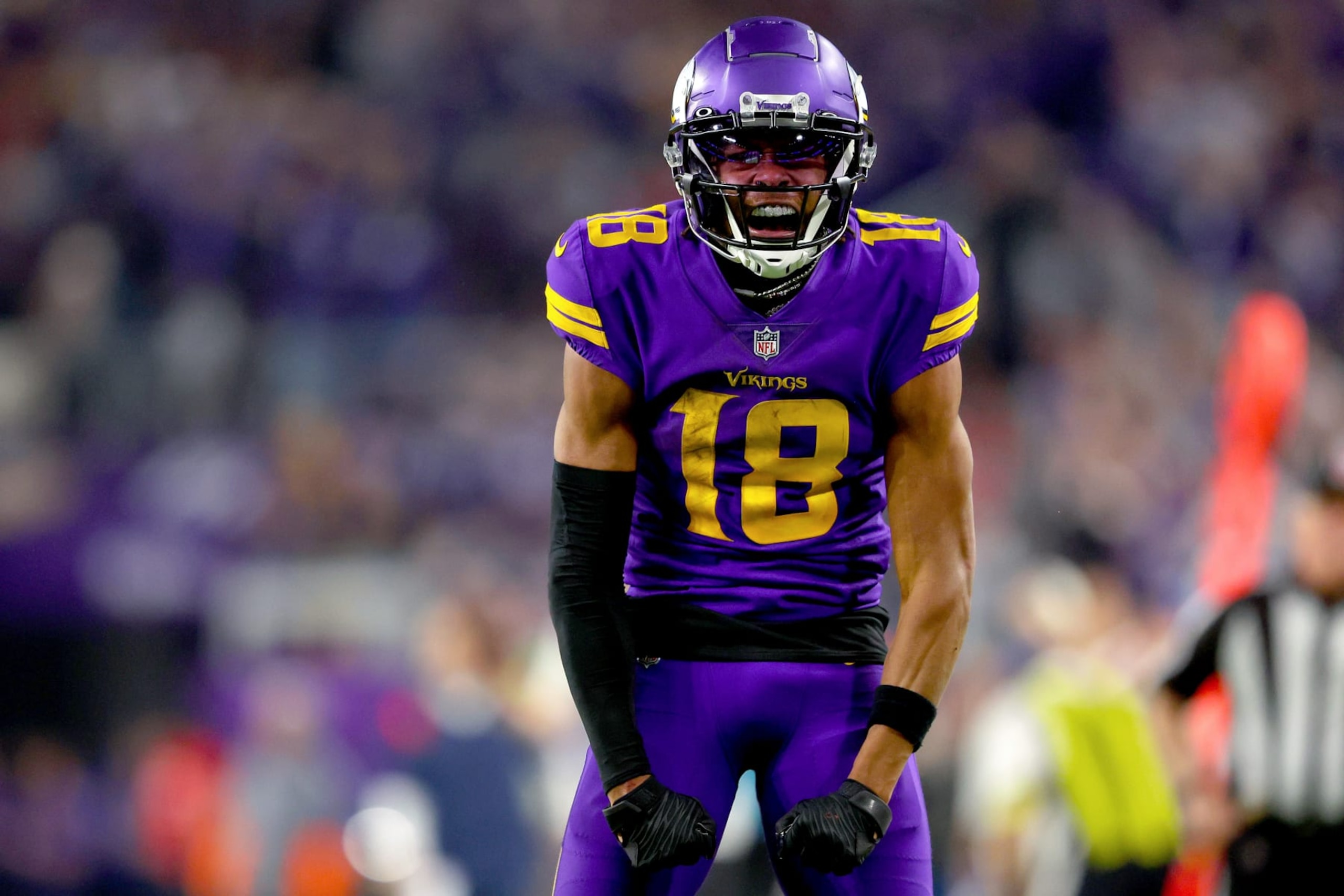 MINNEAPOLIS, MINNESOTA - NOVEMBER 24: Justin Jefferson #18 of the Minnesota Vikings reacts after a play against the New England Patriots during the fourth quarter at U.S. Bank Stadium on November 24, 2022 in Minneapolis, Minnesota. (Photo by Adam Bettcher/Getty Images) MINNEAPOLIS, MINNESOTA - NOVEMBER 24: Justin Jefferson #18 of the Minnesota Vikings reacts after a play against the New England Patriots during the fourth quarter at U.S. Bank Stadium on November 24, 2022 in Minneapolis, Minnesota. (Photo by Adam Bettcher/Getty Images)