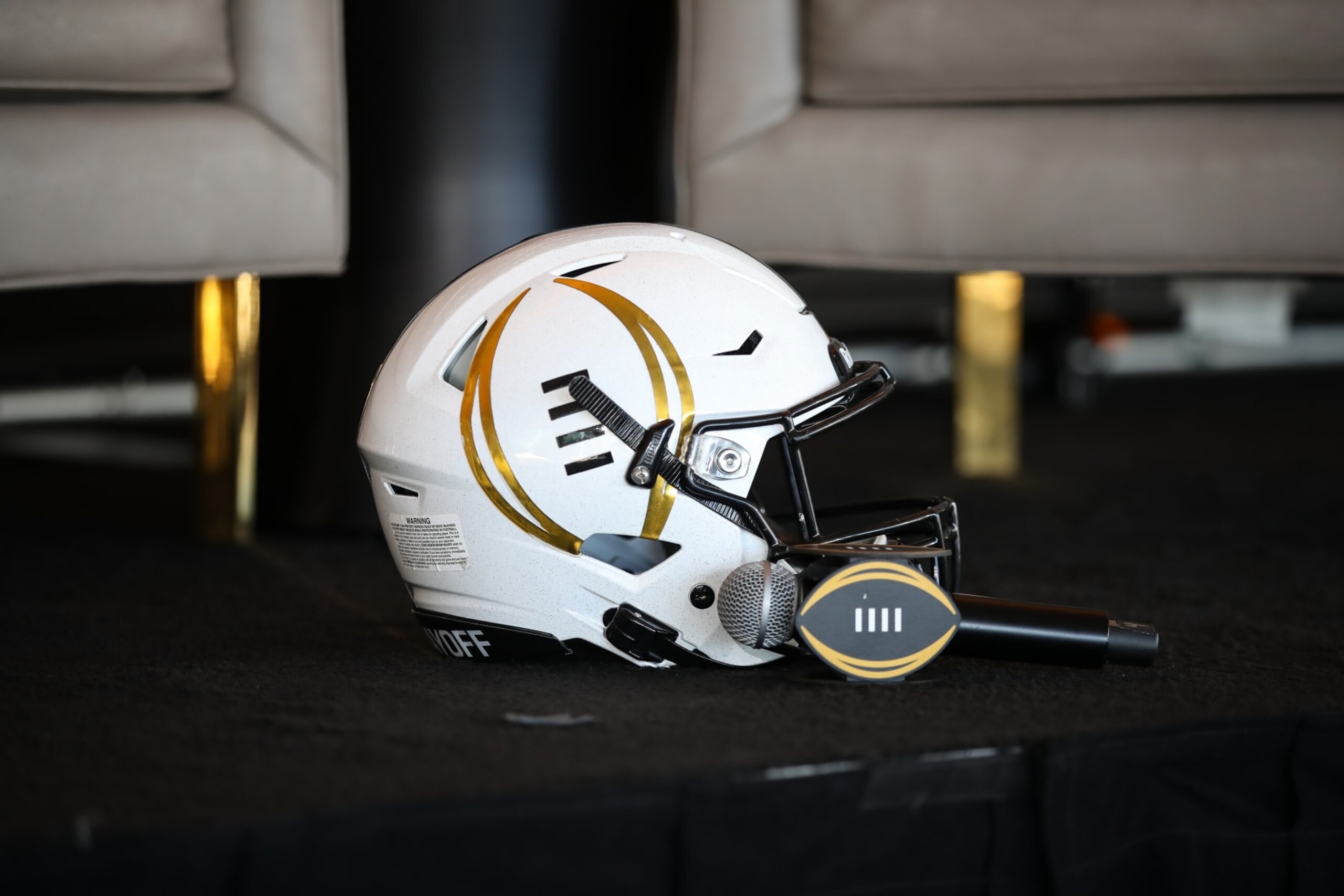 LOS ANGELES, CA - NOVEMBER 19: CFP logo helmet during the College Football Playoff press conference and media roundtable on November 19, 2022, at Banc of California Stadium in Los Angeles, CA. (Photo by Jevone Moore/Icon Sportswire via Getty Images) LOS ANGELES, CA - NOVEMBER 19: CFP logo helmet during the College Football Playoff press conference and media roundtable on November 19, 2022, at Banc of California Stadium in Los Angeles, CA. (Photo by Jevone Moore/Icon Sportswire via Getty Images)