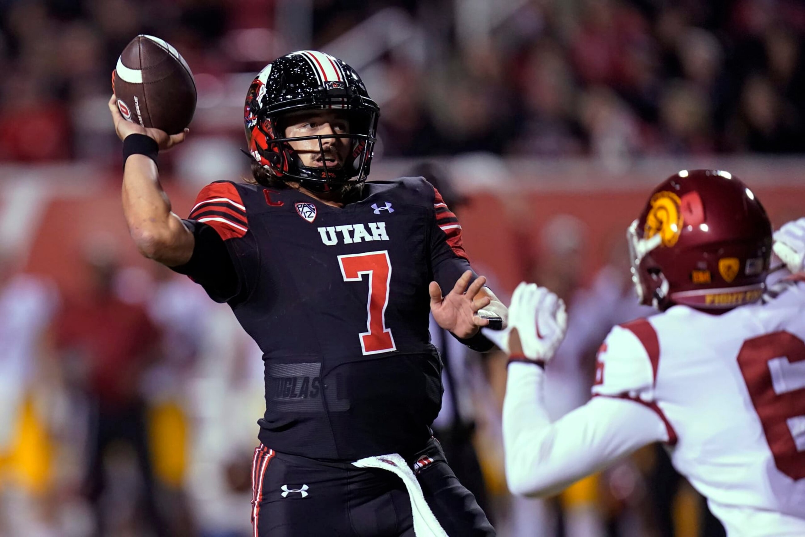 Utah quarterback Cameron Rising (7) throws a pass against Southern California during the second half of an NCAA college football game Saturday, Oct. 15, 2022, in Salt Lake City. (AP Photo/Rick Bowmer) Utah quarterback Cameron Rising (7) throws a pass against Southern California during the second half of an NCAA college football game Saturday, Oct. 15, 2022, in Salt Lake City. (AP Photo/Rick Bowmer)