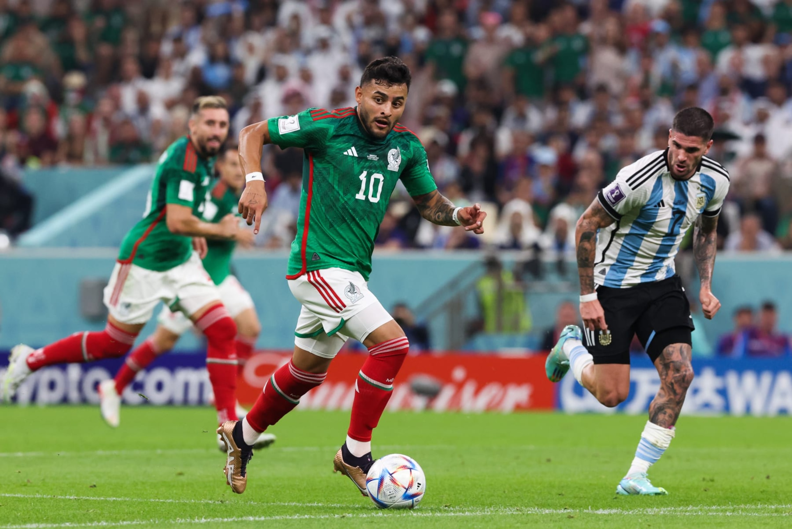 LUSAIL CITY, QATAR - NOVEMBER 26: Alexis Vega #10 of Mexico drives the ball during the FIFA World Cup Qatar 2022 Group C match between Argentina and Mexico at Lusail Stadium on November 26, 2022 in Lusail City, Qatar. (Photo by VCG/VCG via Getty Images)