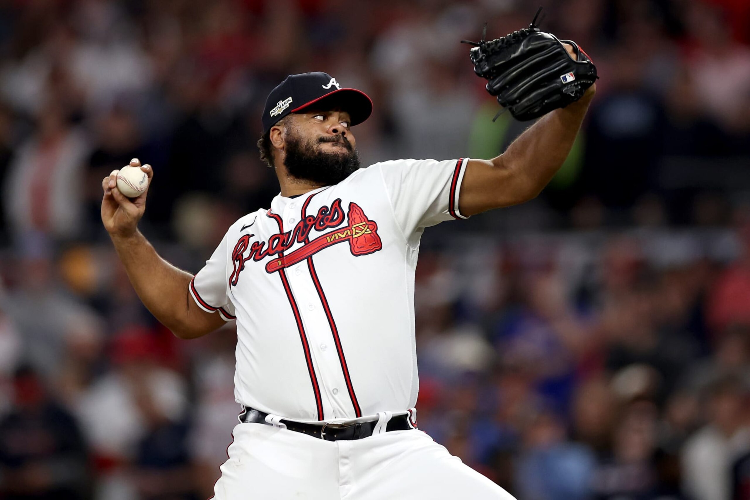 ATLANTA, GEORGIA - OCTOBER 12: Kenley Jansen #74 of the Atlanta Braves delivers a pitch against the Philadelphia Phillies during the ninth inning in game two of the National League Division Series at Truist Park on October 12, 2022 in Atlanta, Georgia. (Photo by Patrick Smith/Getty Images)