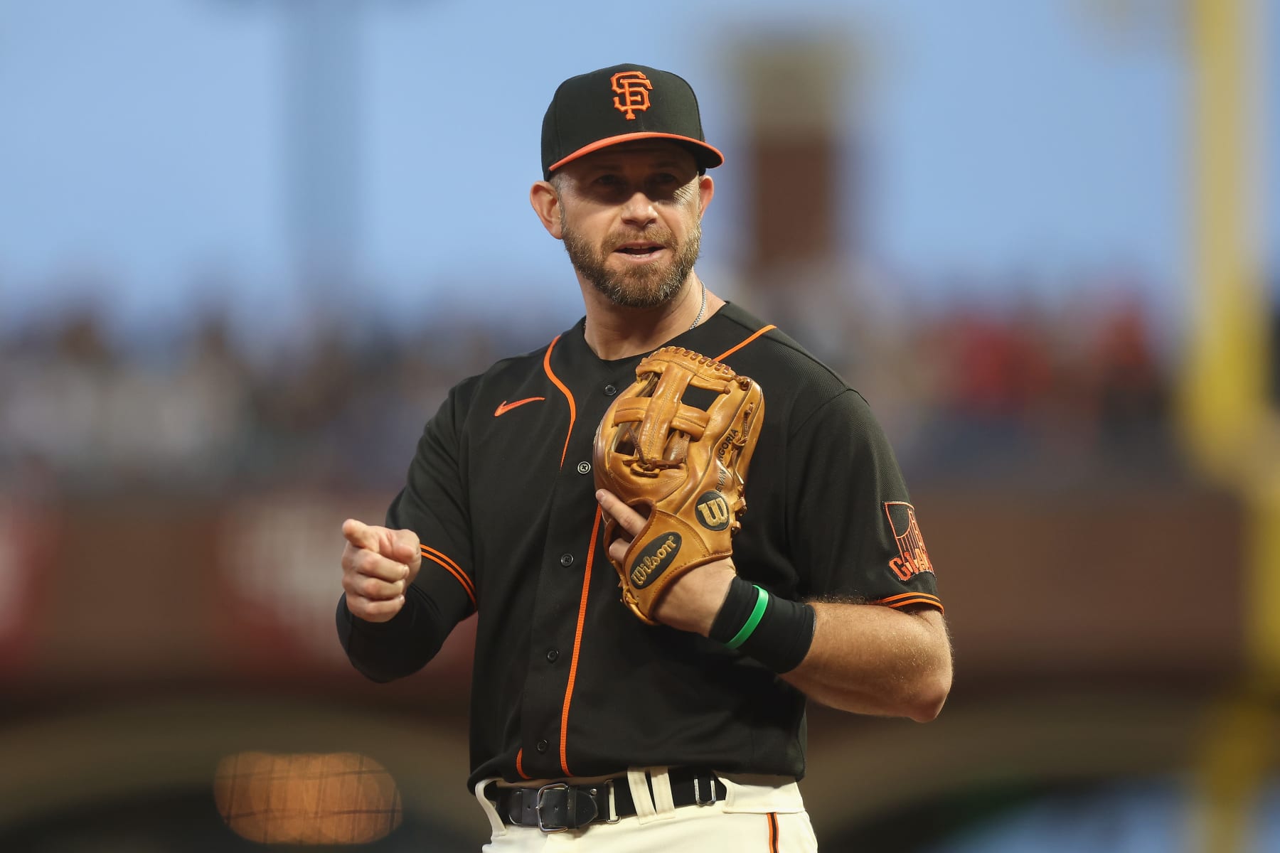 SAN FRANCISCO, CALIFORNIA - SEPTEMBER 17: Third baseman Evan Longoria #10 of the San Francisco Giants reacts after Will Smith #16 of the Los Angeles Dodgers hit a single down the third base line at Oracle Park on September 17, 2022 in San Francisco, California. (Photo by Lachlan Cunningham/Getty Images)