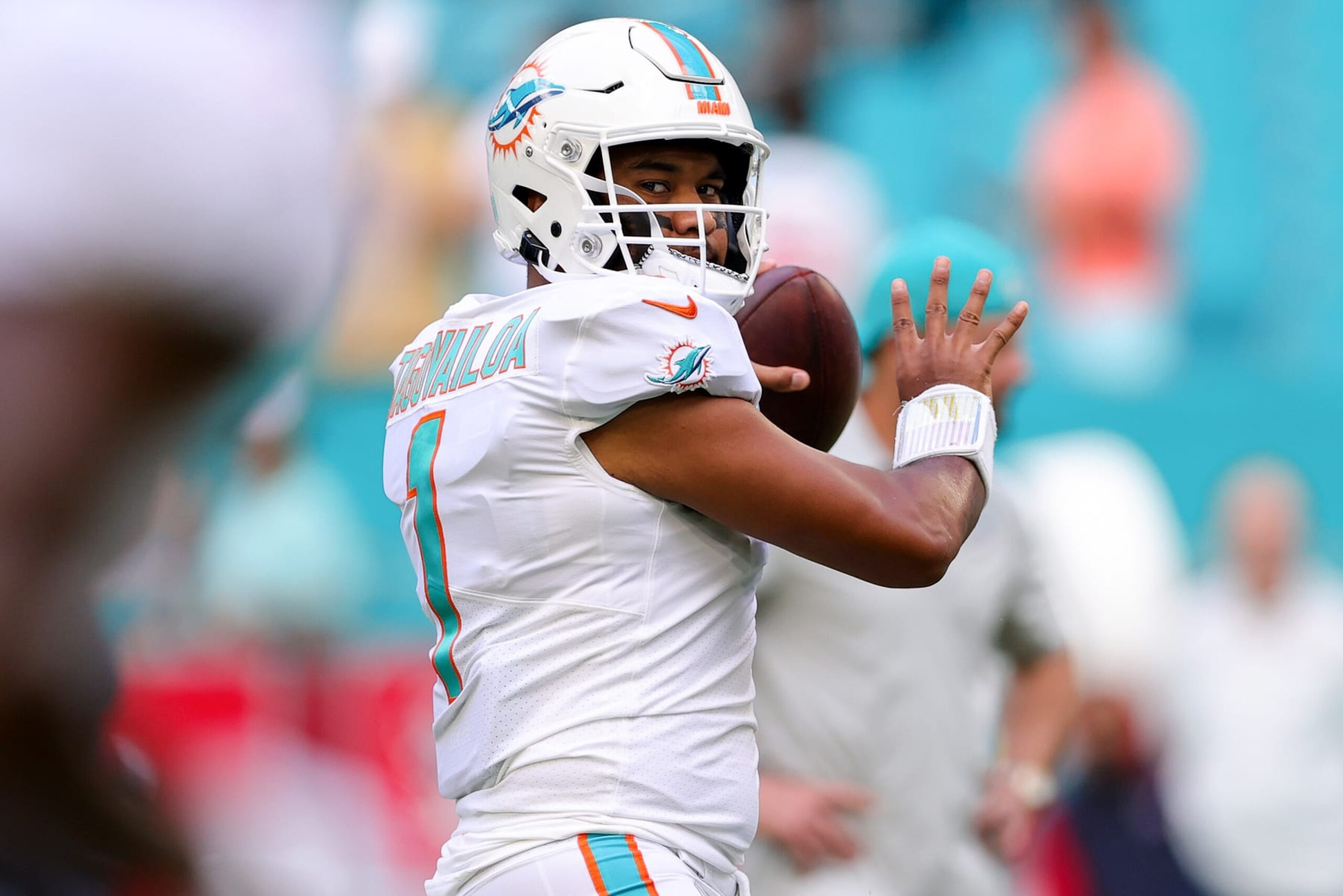 MIAMI GARDENS, FLORIDA - NOVEMBER 27: Tua Tagovailoa #1 of the Miami Dolphins warms up prior to a game against the Houston Texans at Hard Rock Stadium on November 27, 2022 in Miami Gardens, Florida. (Photo by Megan Briggs/Getty Images) MIAMI GARDENS, FLORIDA - NOVEMBER 27: Tua Tagovailoa #1 of the Miami Dolphins warms up prior to a game against the Houston Texans at Hard Rock Stadium on November 27, 2022 in Miami Gardens, Florida. (Photo by Megan Briggs/Getty Images)