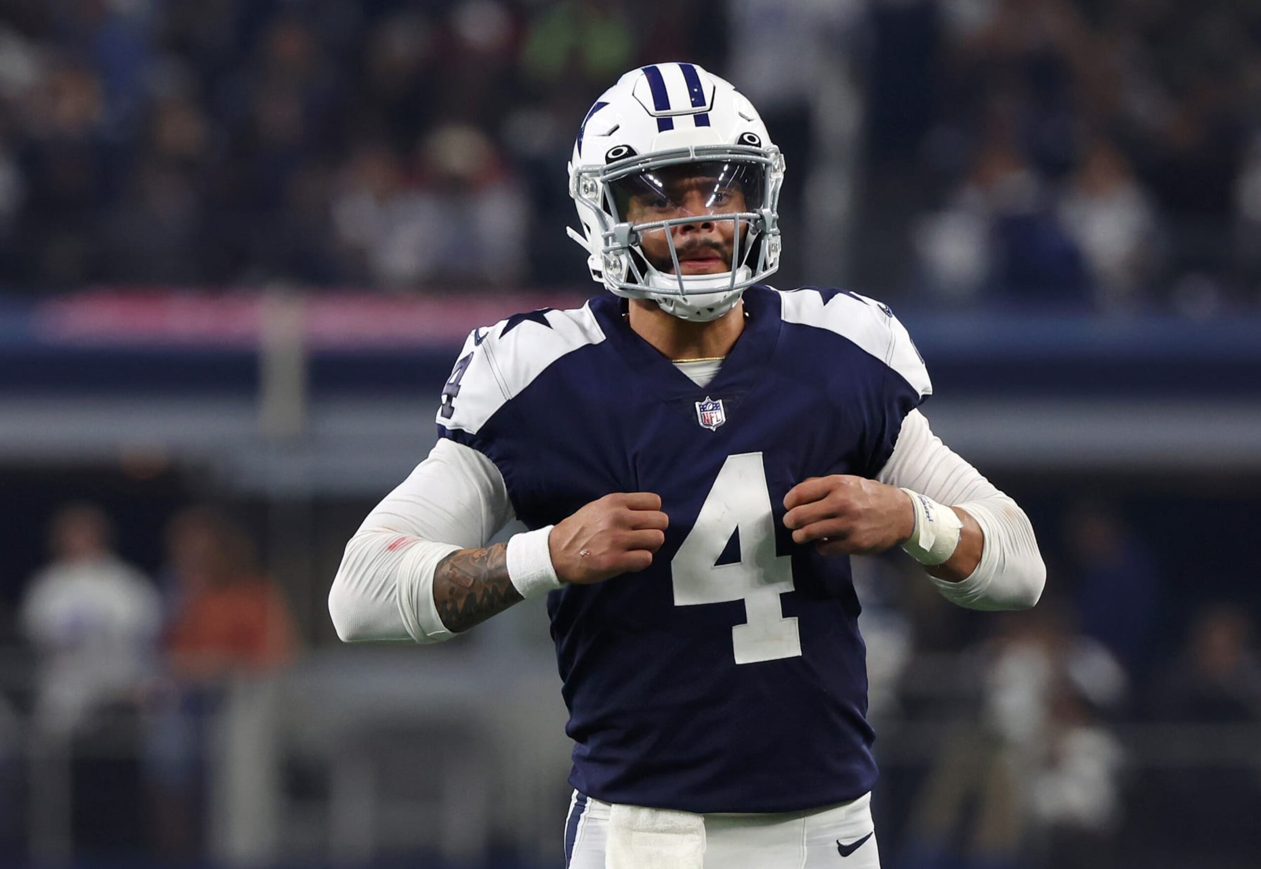 ARLINGTON, TEXAS - NOVEMBER 24: Dak Prescott #4 of the Dallas Cowboys stands on the field during a game against the New York Giants at AT&T Stadium on November 24, 2022 in Arlington, Texas. (Photo by Richard Rodriguez/Getty Images) ARLINGTON, TEXAS - NOVEMBER 24: Dak Prescott #4 of the Dallas Cowboys stands on the field during a game against the New York Giants at AT&T Stadium on November 24, 2022 in Arlington, Texas. (Photo by Richard Rodriguez/Getty Images)