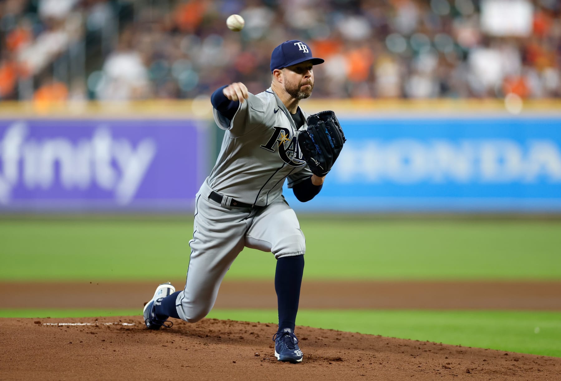 HOUSTON, TEXAS - OCTOBER 02: Corey Kluber #28 of the Tampa Bay Rays pitches in the first inning against the Houston Astros at Minute Maid Park on October 02, 2022 in Houston, Texas. (Photo by Tim Warner/Getty Images)