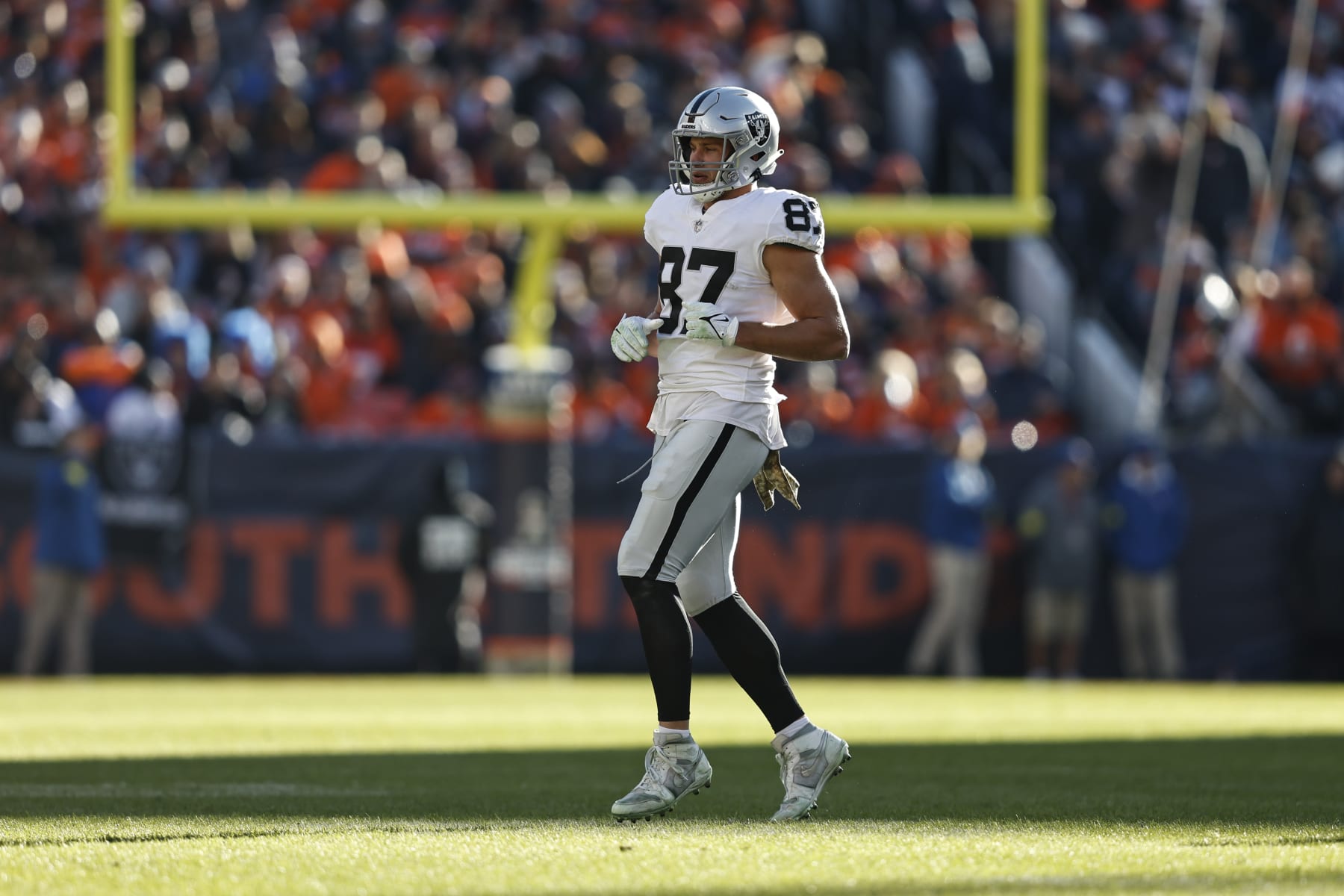 DENVER, COLORADO - NOVEMBER 20: Foster Moreau #87 of the Las Vegas Raiders runs during an NFL game between the Las Vegas Raiders and Denver Broncos at Empower Field At Mile High on November 20, 2022 in Denver, Colorado. The Las Vegas Raiders won in overtime (Photo by Michael Owens/Getty Images)