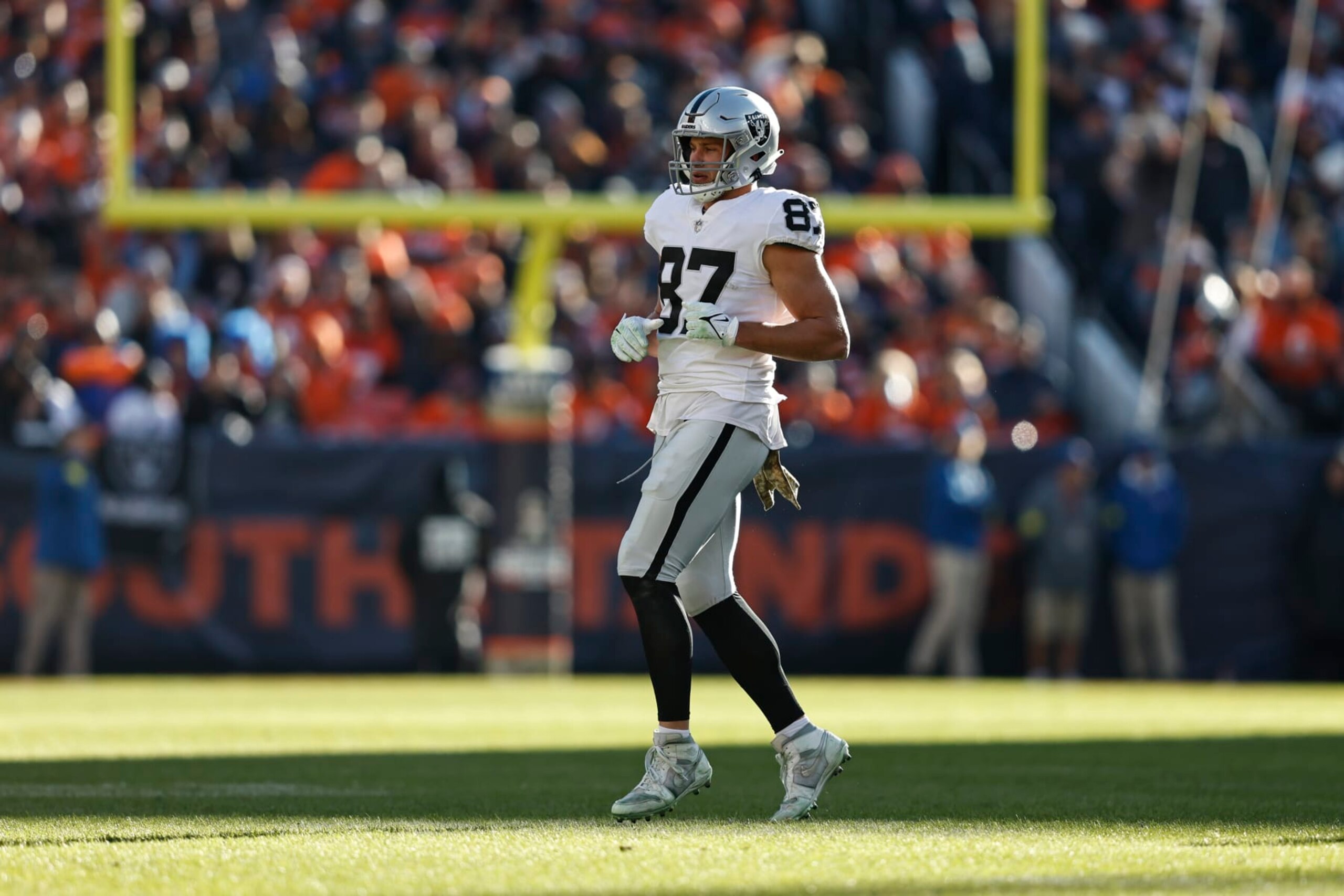DENVER, COLORADO - NOVEMBER 20: Foster Moreau #87 of the Las Vegas Raiders runs during an NFL game between the Las Vegas Raiders and Denver Broncos at Empower Field At Mile High on November 20, 2022 in Denver, Colorado. The Las Vegas Raiders won in overtime (Photo by Michael Owens/Getty Images)