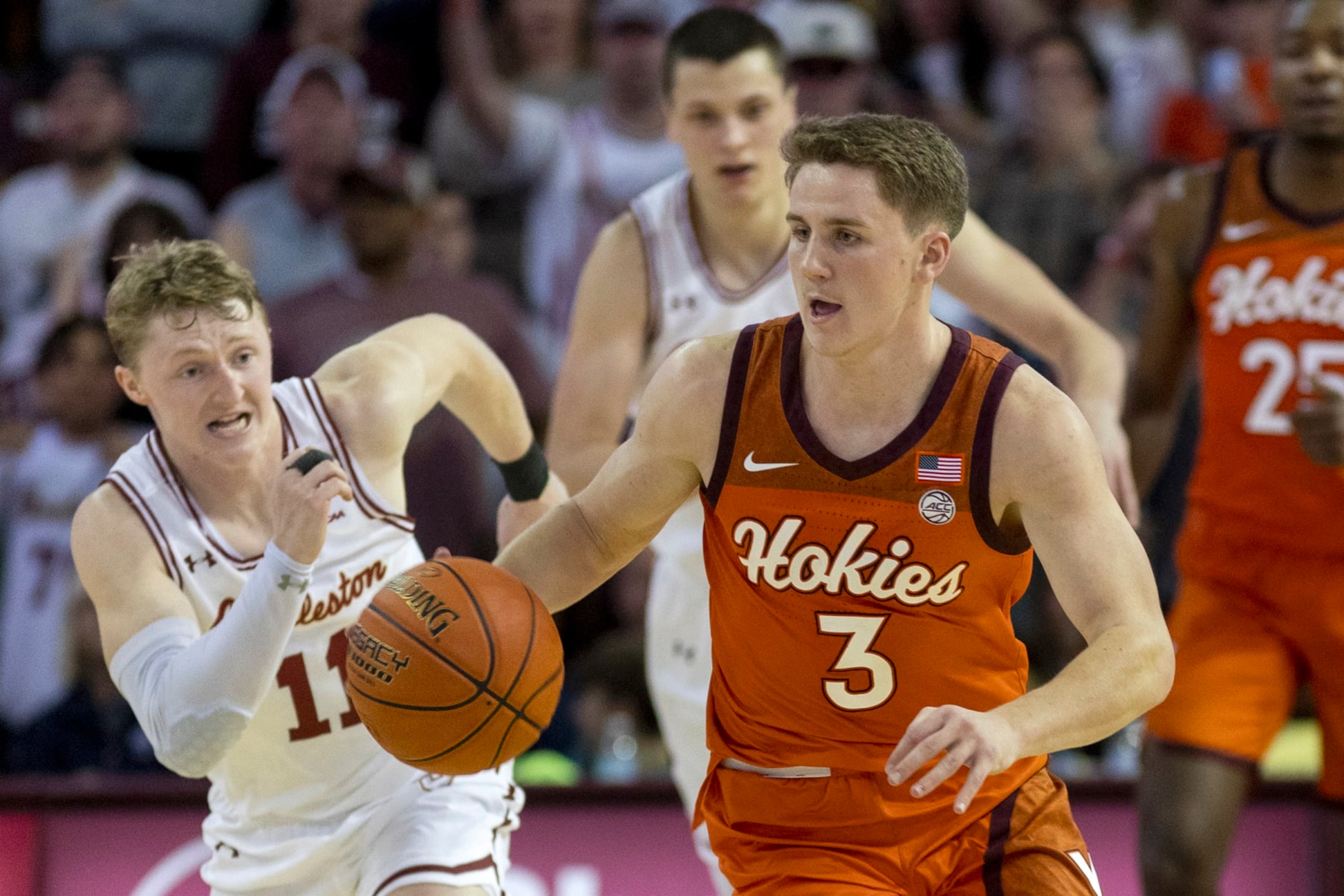 Virginia Tech's Sean Pedulla (3) drives the basketball against the defense of College of Charleston's Ryan Larson (11) in the second half of an NCAA college basketball game during the championship of the Charleston Classic in Charleston, S.C., Sunday, Nov. 20, 2022. (AP Photo/Mic Smith)