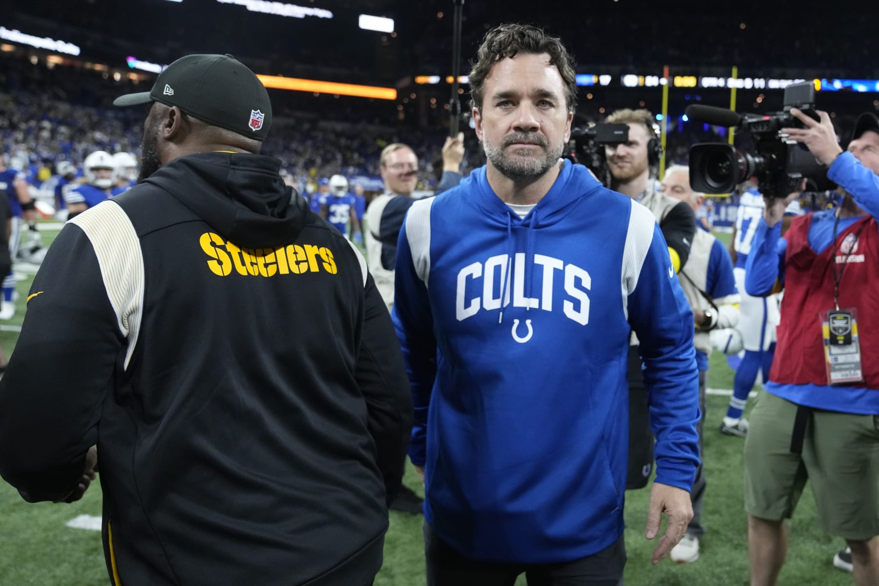 Indianapolis Colts interim head coach Jeff Saturday greets Pittsburgh Steelers head coach Mike Tomlin following an NFL football game, Monday, Nov. 28, 2022, in Indianapolis. (AP Photo/Michael Conroy)