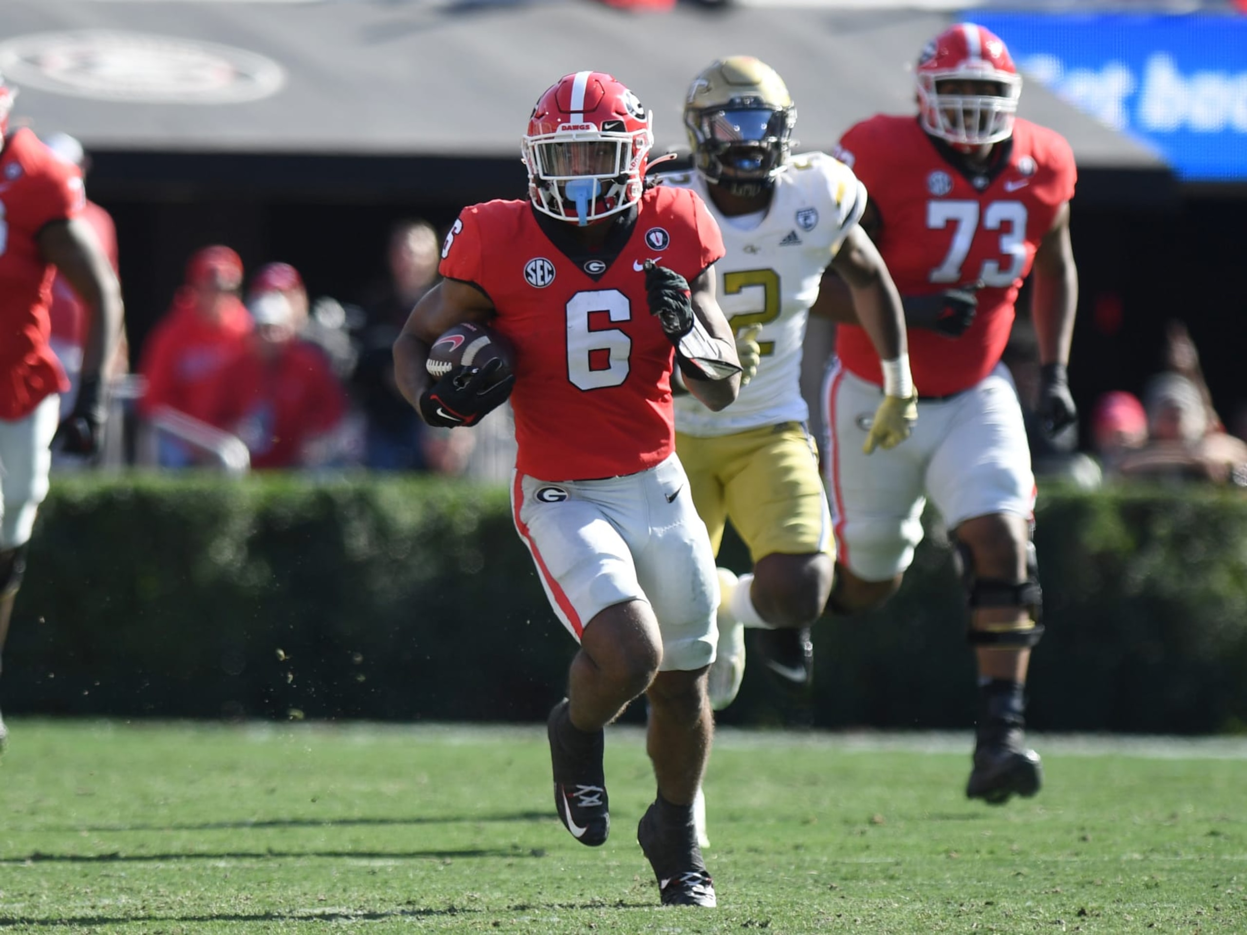 ATHENS, GA - NOVEMBER 26: Georgia Bulldogs Running Back Kenny McIntosh (6) rushes the ball during the college football game between the Georgia Tech Yellow Jackets and the Georgia Bulldogs on November 26, 2022, at Sanford Stadium in Athens, GA. (Photo by Jeffrey Vest/Icon Sportswire via Getty Images) ATHENS, GA - NOVEMBER 26: Georgia Bulldogs Running Back Kenny McIntosh (6) rushes the ball during the college football game between the Georgia Tech Yellow Jackets and the Georgia Bulldogs on November 26, 2022, at Sanford Stadium in Athens, GA. (Photo by Jeffrey Vest/Icon Sportswire via Getty Images)