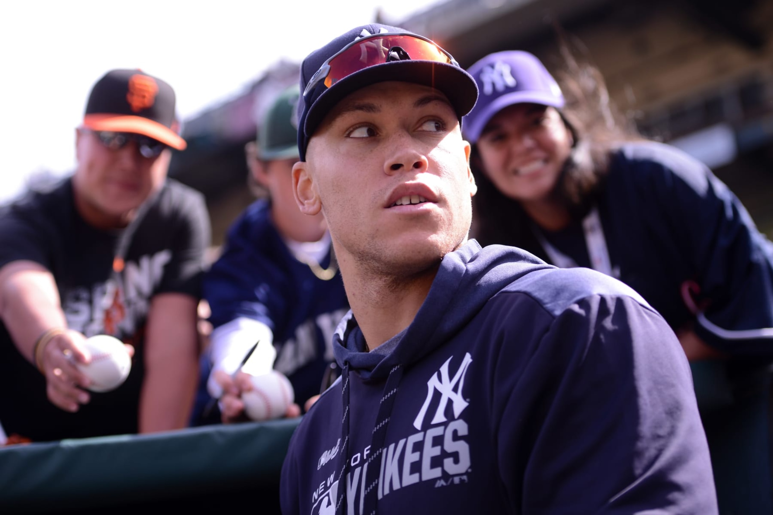 SAN FRANCISCO, CA - APRIL 27: New York Yankees right fielder Aaron Judge (99) signs autographs during the Major League Baseball game between the New York Yankees and the San Francisco Giants at Oracle Park on April 27, 2019 in San Francisco,  CA. (Photo by Cody Glenn/Icon Sportswire via Getty Images)