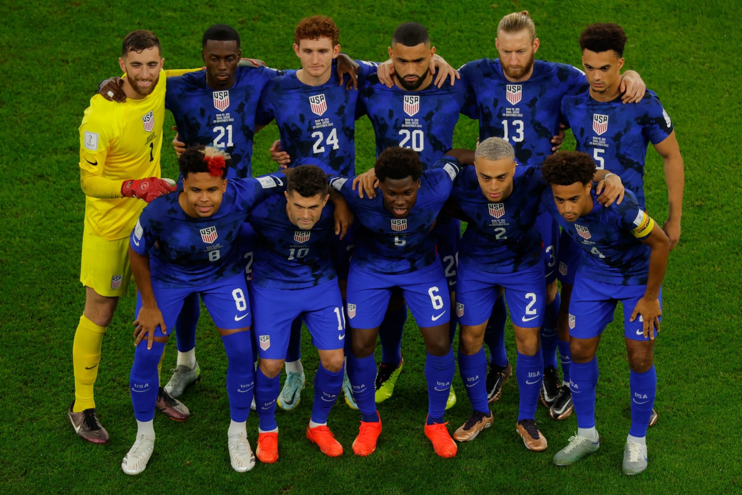 (Back L) USA's goalkeeper #01 Matt Turner, USA's forward #21 Timothy Weah, USA's forward #24 Josh Sargent, USA's defender #13 Tim Ream, USA's defender #05 Antonee Robinson, (front L) USA's midfielder #08 Weston McKennie, USA's forward #10 Christian Pulisic, USA's midfielder #06 Yunus Musah, USA's defender #02 Sergino Dest, USA's midfielder #04 Tyler Adams pose for a group picture during the Qatar 2022 World Cup Group B football match between Iran and USA at the Al-Thumama Stadium in Doha on November 29, 2022. (Photo by Odd ANDERSEN / AFP) (Photo by ODD ANDERSEN/AFP via Getty Images)
