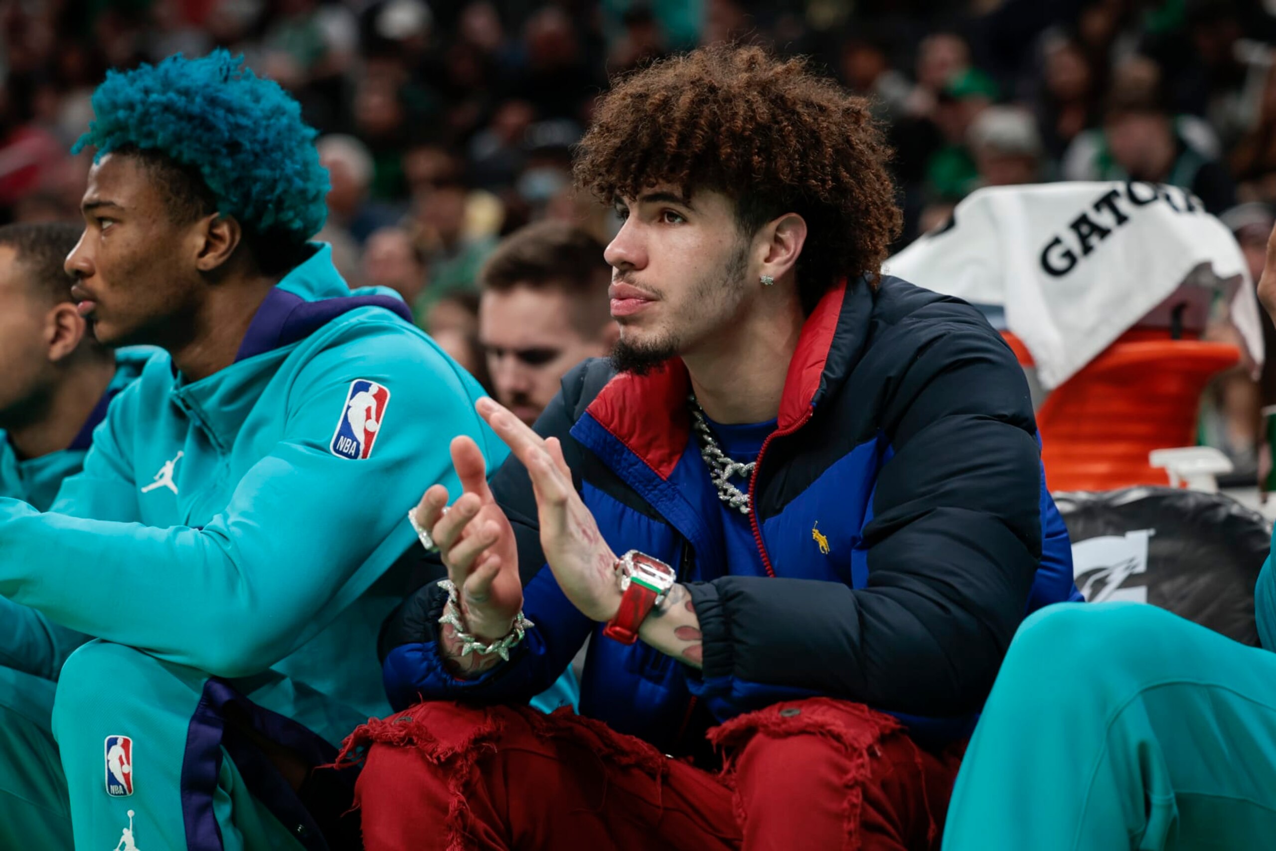 BOSTON, MA - NOVEMBER 28  LaMelo Ball #1 of the Charlotte Hornets looks on from the bench during a game against the Charlotte Hornets at TD Garden on November 28, 2022 in Boston, Massachusetts. NOTE TO USER: User expressly acknowledges and agrees that, by downloading and or using this photograph, User is consenting to the terms and conditions of the Getty Images License Agreement. (Photo by Adam Glanzman/Getty Images)