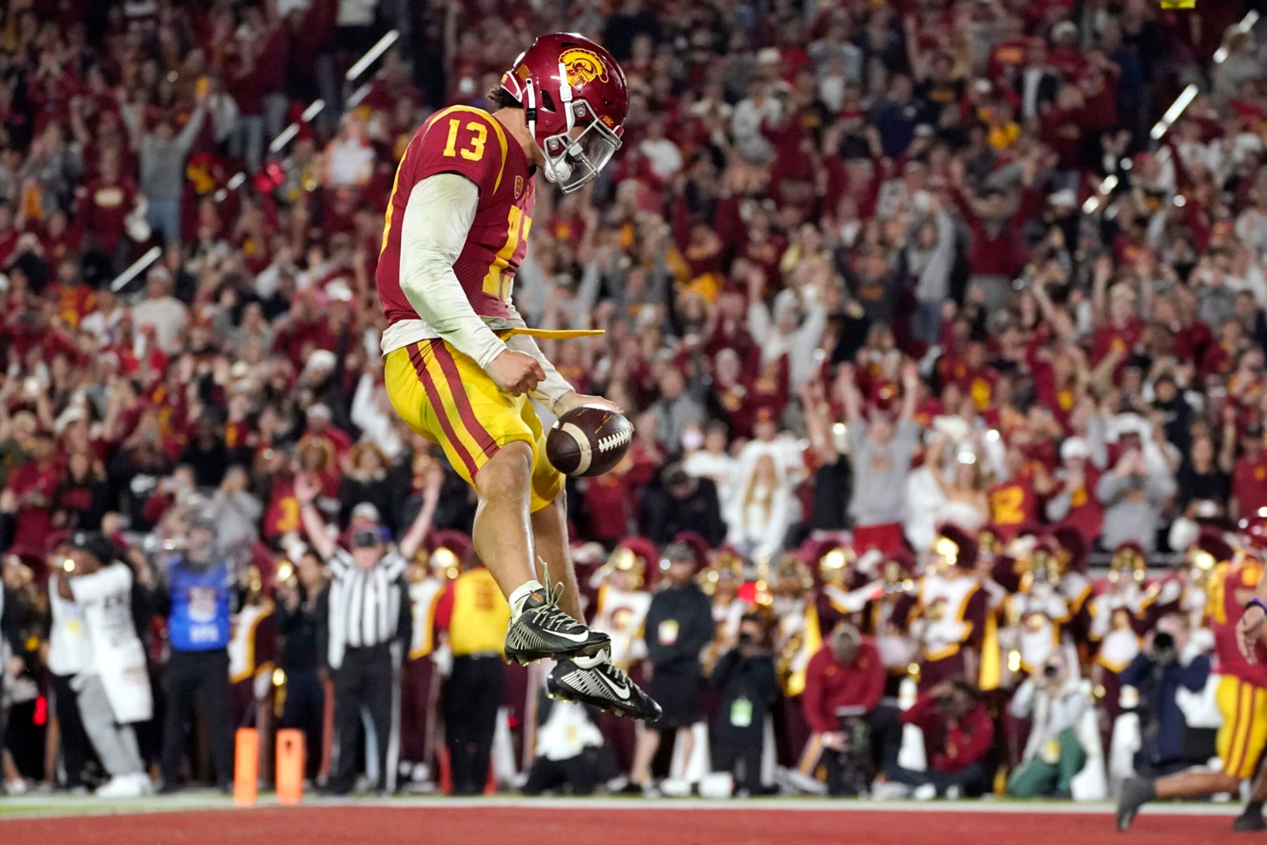 Southern California quarterback Caleb Williams celebrates after running in for a touchdown during the first half of an NCAA college football game against Notre Dame Saturday, Nov. 26, 2022, in Los Angeles. (AP Photo/Mark J. Terrill)