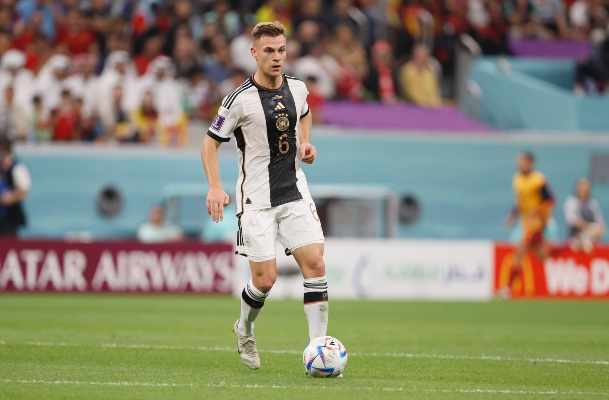 AL KHOR, QATAR - NOVEMBER 27: Joshua Kimmich of Germany on the ball during the FIFA World Cup Qatar 2022 Group E match between Spain and Germany at Al Bayt Stadium on November 27, 2022 in Al Khor, Qatar. (Photo by Richard Sellers/Getty Images) AL KHOR, QATAR - NOVEMBER 27: Joshua Kimmich of Germany on the ball during the FIFA World Cup Qatar 2022 Group E match between Spain and Germany at Al Bayt Stadium on November 27, 2022 in Al Khor, Qatar. (Photo by Richard Sellers/Getty Images)