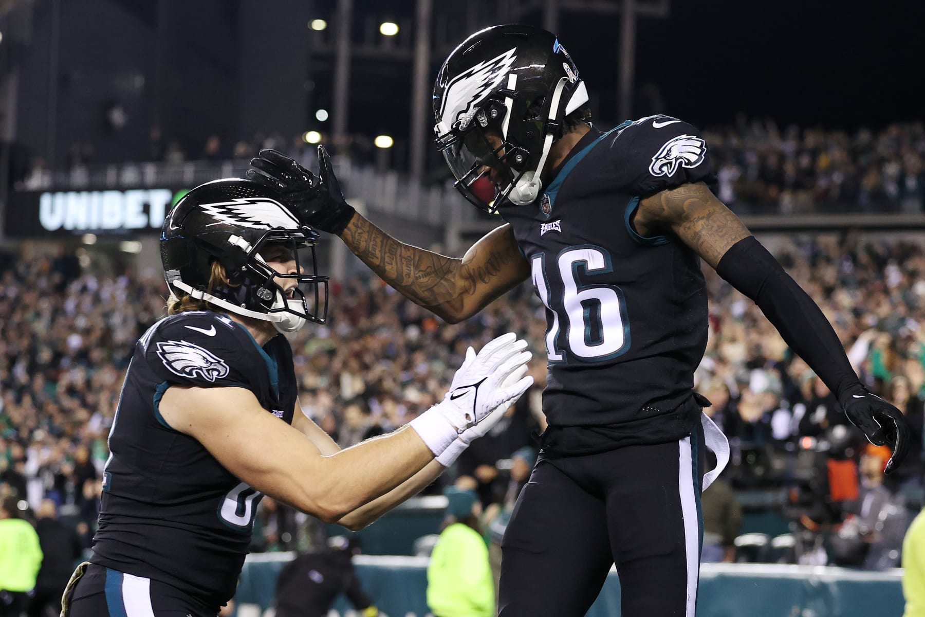 PHILADELPHIA, PENNSYLVANIA - NOVEMBER 27: Quez Watkins #16 of the Philadelphia Eagles celebrates with Grant Calcaterra #81 after scoring a 30-yard receiving touchdown during the second quarter against the Green Bay Packers at Lincoln Financial Field on November 27, 2022 in Philadelphia, Pennsylvania. (Photo by Scott Taetsch/Getty Images)