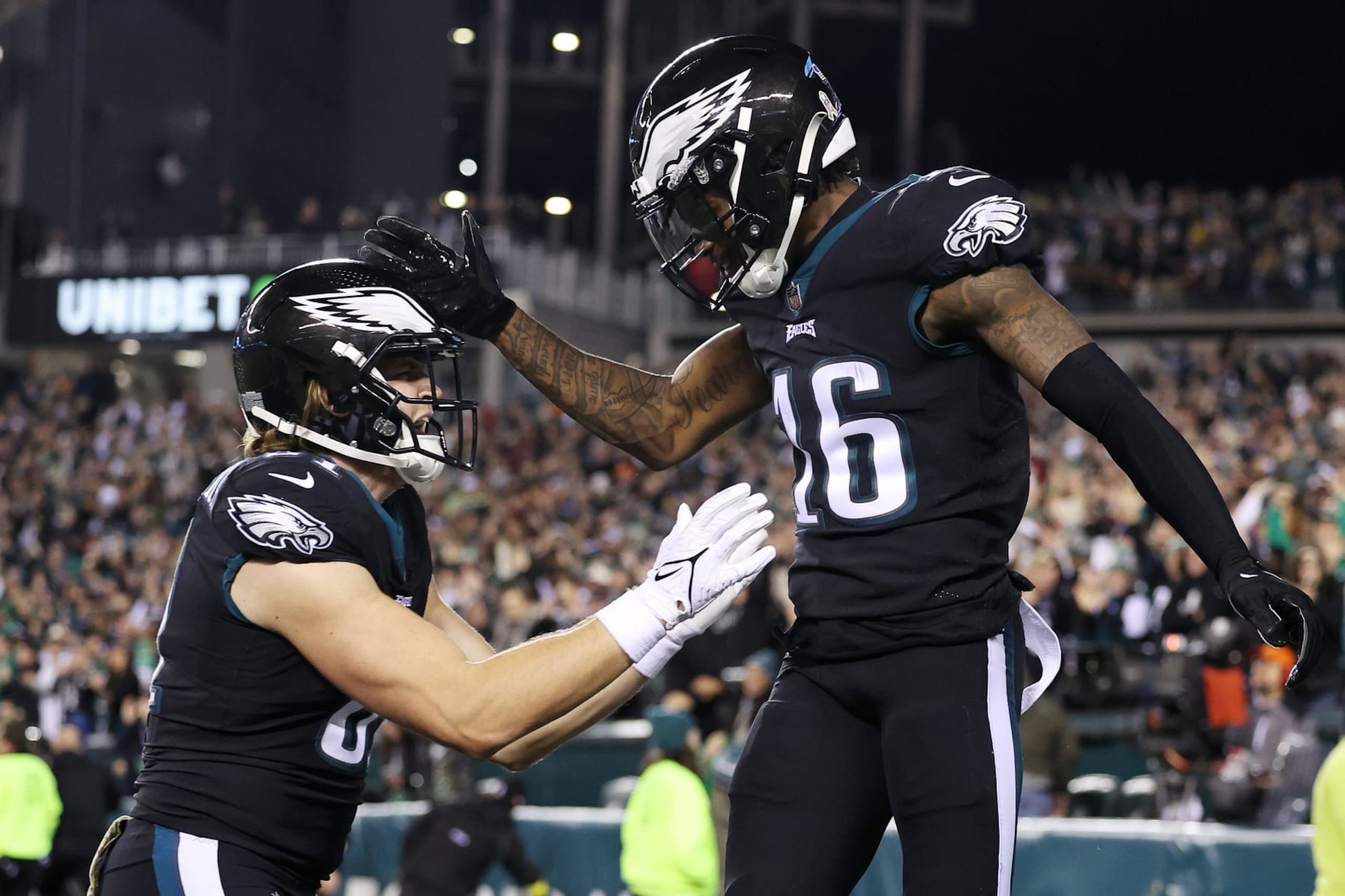 PHILADELPHIA, PENNSYLVANIA - NOVEMBER 27: Quez Watkins #16 of the Philadelphia Eagles celebrates with Grant Calcaterra #81 after scoring a 30-yard receiving touchdown during the second quarter against the Green Bay Packers at Lincoln Financial Field on November 27, 2022 in Philadelphia, Pennsylvania. (Photo by Scott Taetsch/Getty Images)