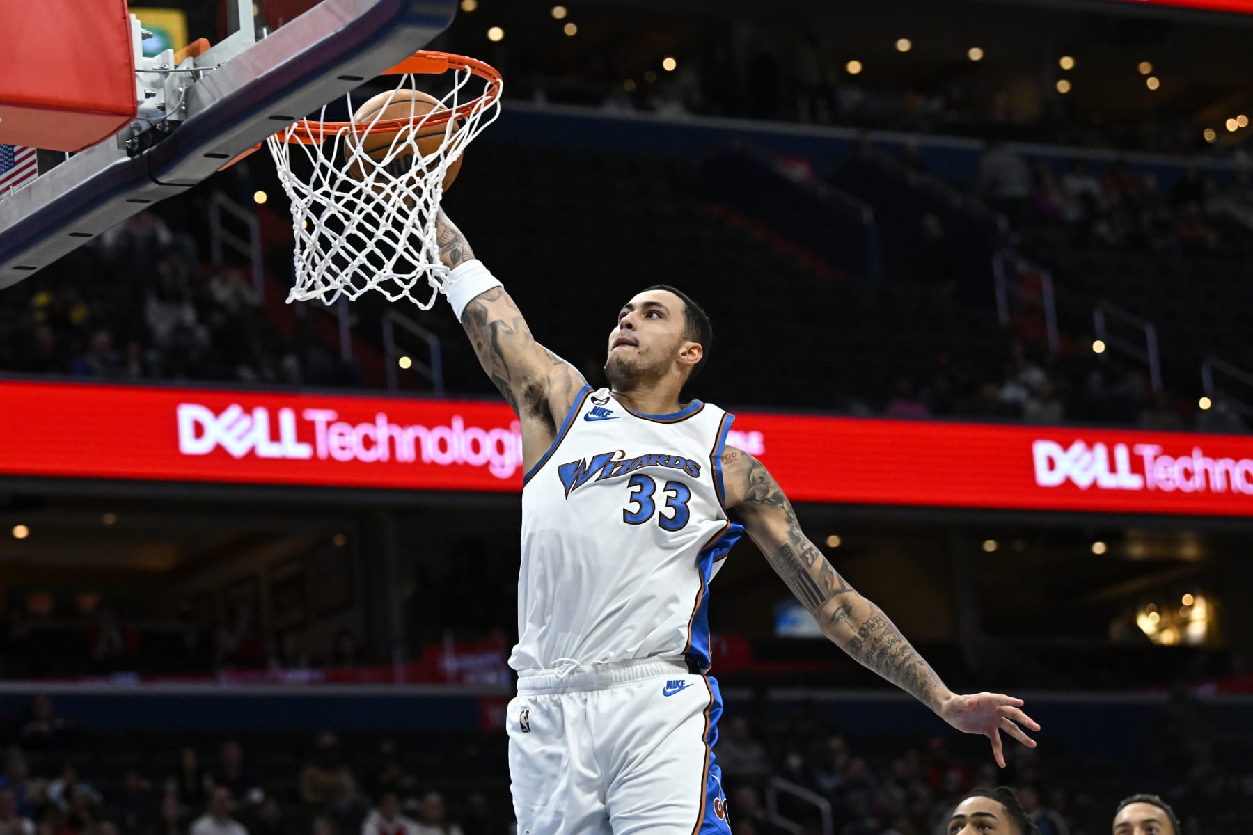 WASHINGTON, DC - NOVEMBER 28:
Washington Wizards forward Kyle Kuzma (33) heads to the hoop for two of his 23 points in the first quarter against the Minnesota Timberwolves at Capital One Arena November 28, 2022 in Washington, DC. The Washington Wizards beat the Minnesota Timberwolves 142-127.
(Photo by Katherine Frey/The Washington Post via Getty Images)