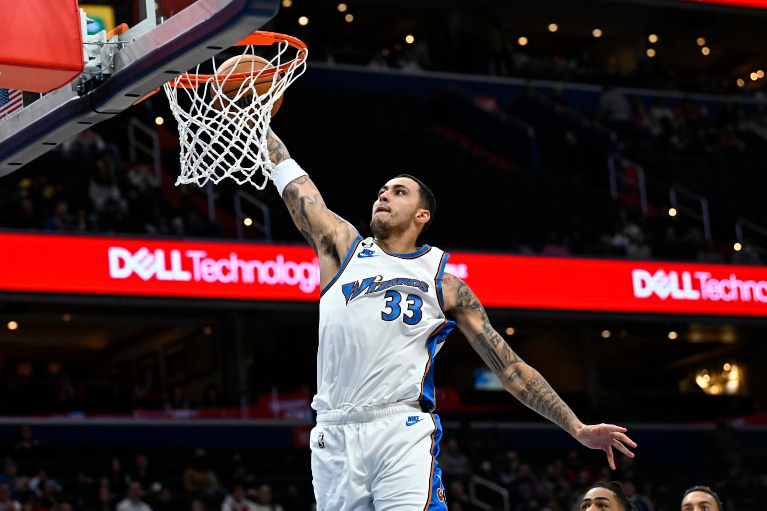 WASHINGTON, DC - NOVEMBER 28:
Washington Wizards forward Kyle Kuzma (33) heads to the hoop for two of his 23 points in the first quarter against the Minnesota Timberwolves at Capital One Arena November 28, 2022 in Washington, DC. The Washington Wizards beat the Minnesota Timberwolves 142-127.
(Photo by Katherine Frey/The Washington Post via Getty Images)