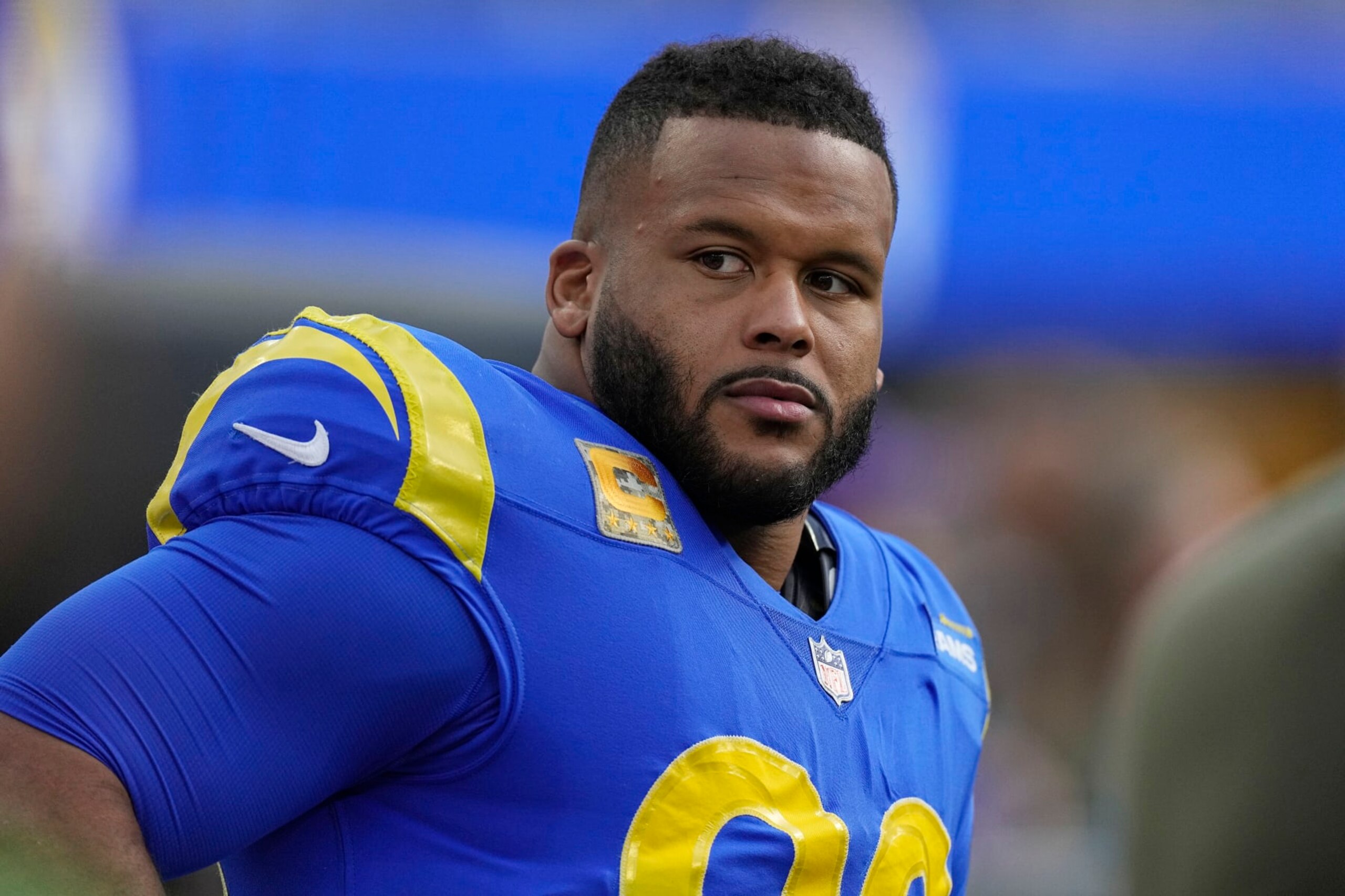 Los Angeles Rams defensive tackle Aaron Donald looks on from the bench during the first half of an NFL football game against the Arizona Cardinals Sunday, Nov. 13, 2022, in Inglewood, Calif. (AP Photo/Mark J. Terrill)