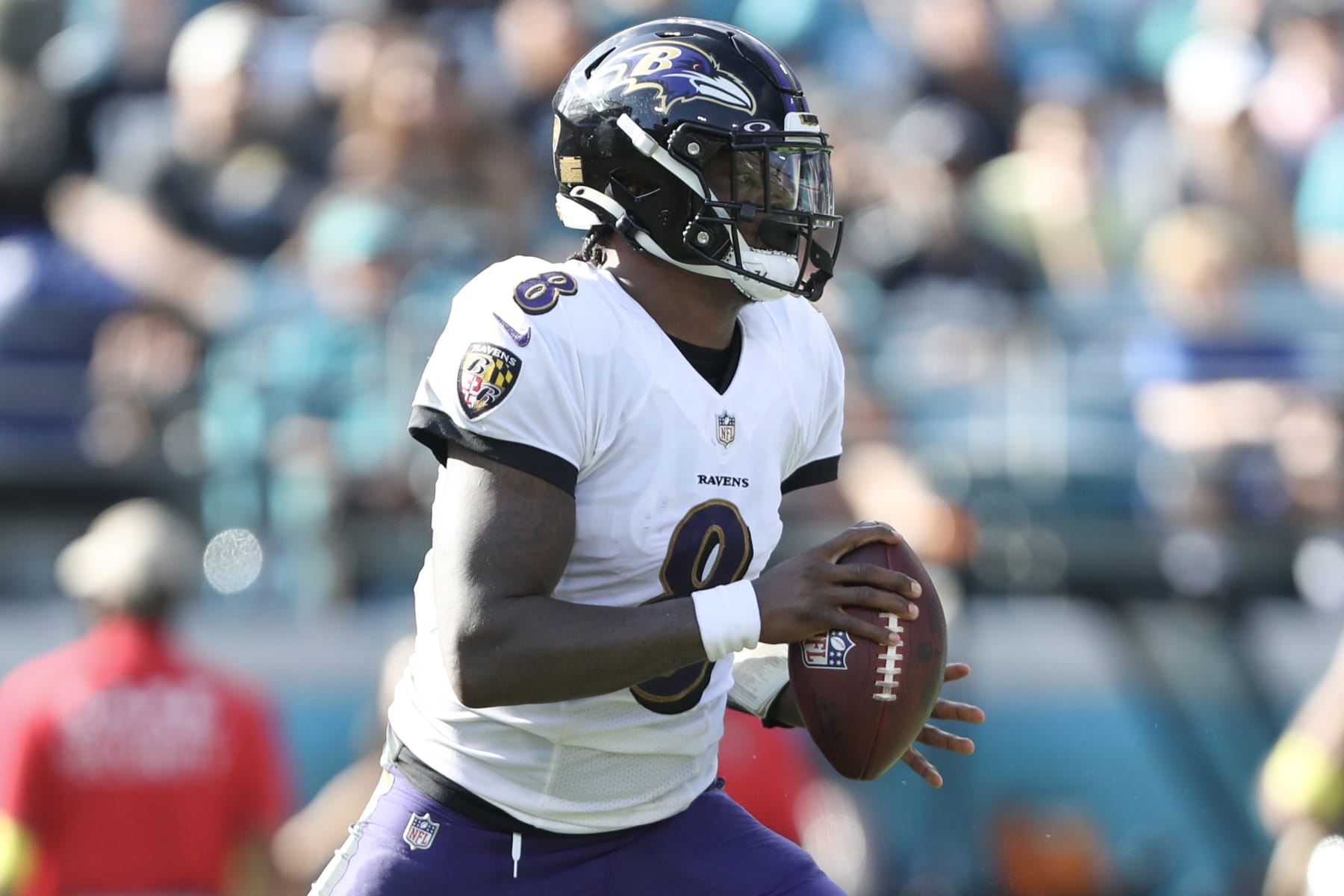 JACKSONVILLE, FLORIDA - NOVEMBER 27: Lamar Jackson #8 of the Baltimore Ravens drops back to pass during the first half against the Jacksonville Jaguars at TIAA Bank Field on November 27, 2022 in Jacksonville, Florida. (Photo by Courtney Culbreath/Getty Images) JACKSONVILLE, FLORIDA - NOVEMBER 27: Lamar Jackson #8 of the Baltimore Ravens drops back to pass during the first half against the Jacksonville Jaguars at TIAA Bank Field on November 27, 2022 in Jacksonville, Florida. (Photo by Courtney Culbreath/Getty Images)