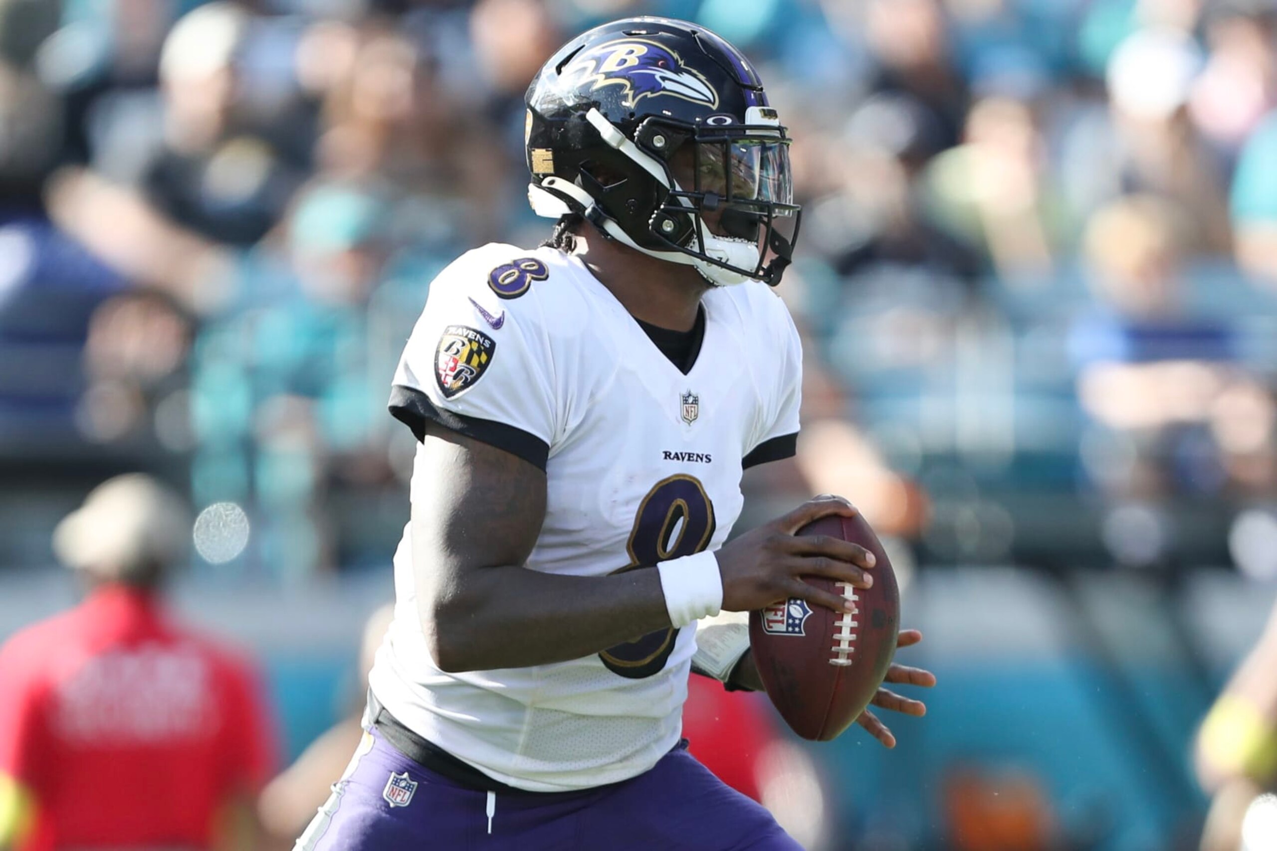 JACKSONVILLE, FLORIDA - NOVEMBER 27: Lamar Jackson #8 of the Baltimore Ravens drops back to pass during the first half against the Jacksonville Jaguars at TIAA Bank Field on November 27, 2022 in Jacksonville, Florida. (Photo by Courtney Culbreath/Getty Images)