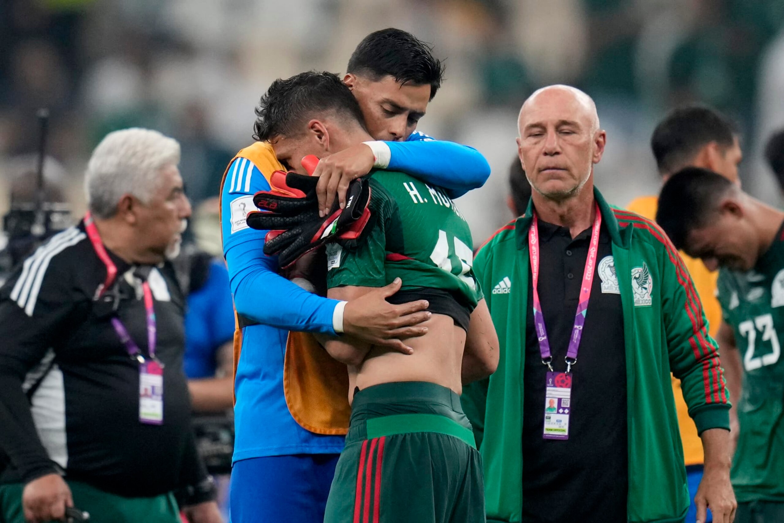 Mexico's Hector Moreno and goalkeeper Alfredo Talavera react at the end of the World Cup group C soccer match between Saudi Arabia and Mexico, at the Lusail Stadium in Lusail, Qatar, Wednesday, Nov. 30, 2022. Mexico won 2-1 but failed to advance in the tournament. (AP Photo/Ricardo Mazalan)