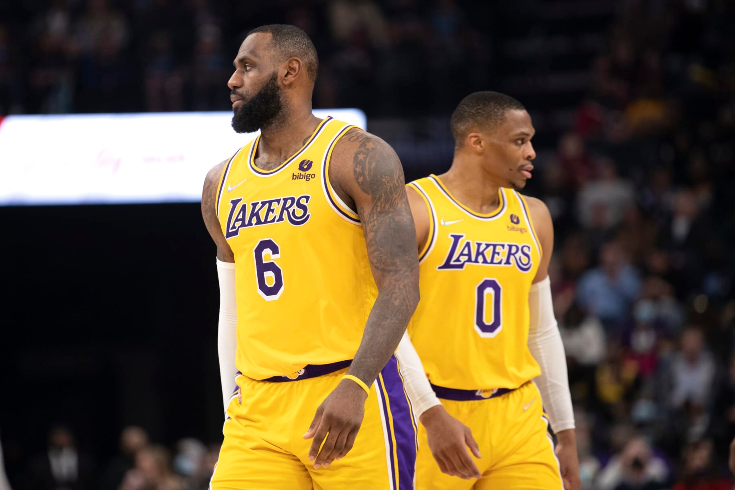 Los Angeles Lakers forward LeBron James (6) and guard Russell Westbrook move in different directions during a break in game action in the second half of an NBA basketball game against the Memphis Grizzlies Wednesday, Dec. 29, 2021, in Memphis, Tenn. (AP Photo/Nikki Boertman)